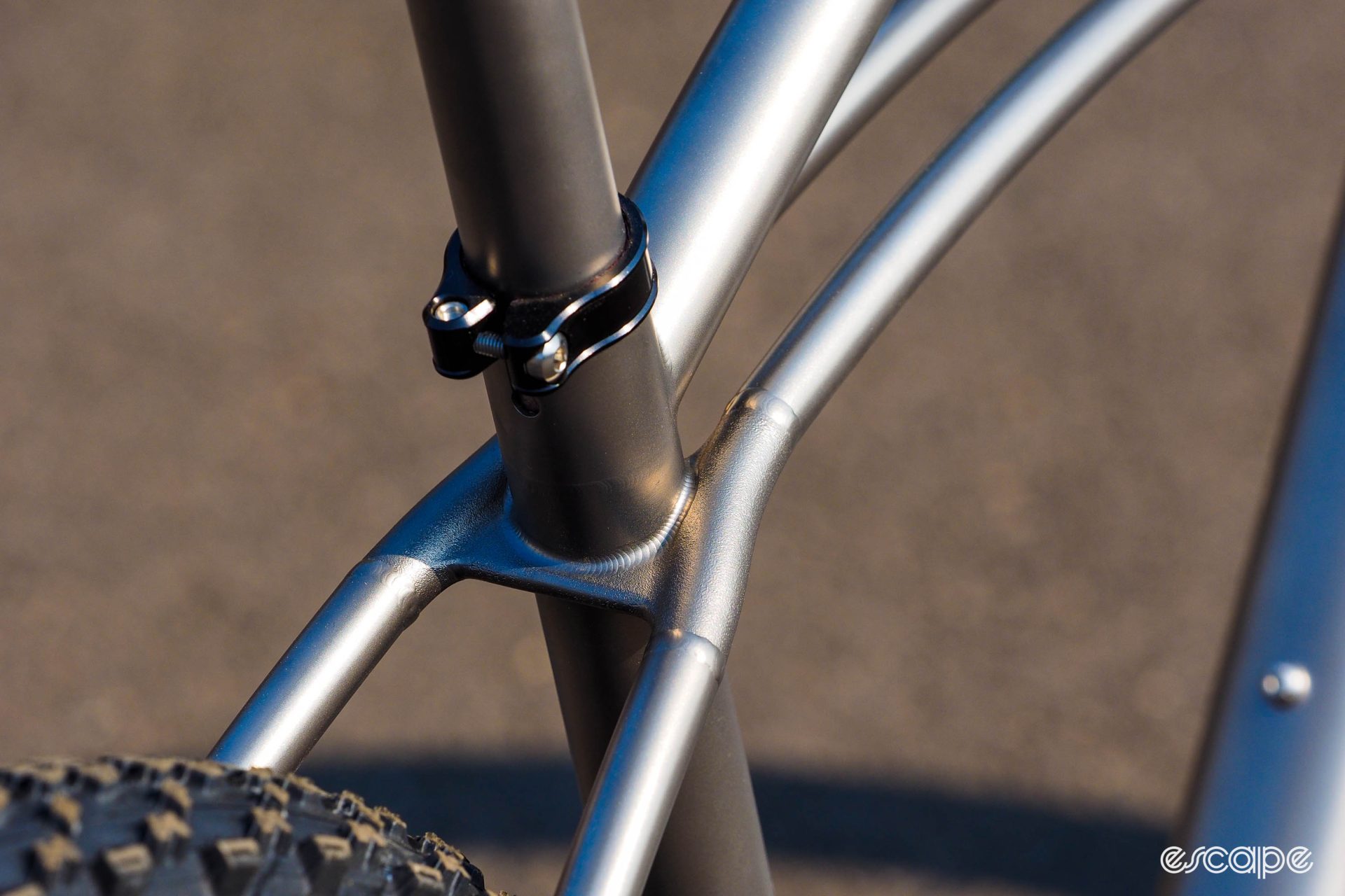 Detail shot of seatpost clamp area, revealing neatly integrated 3D printing.