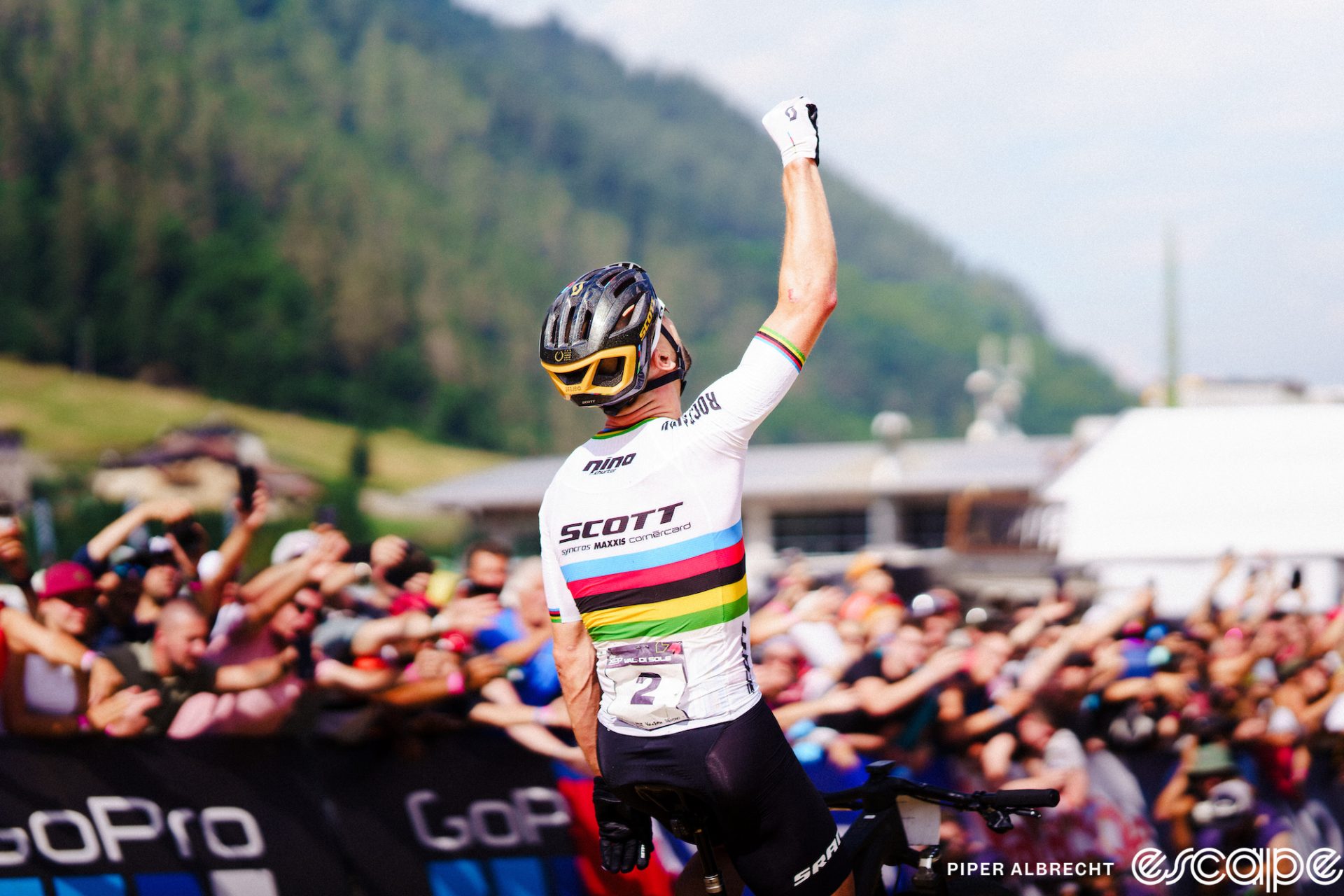 Nino Schurter crosses the finish line first, finger pointed to the sky, in what is a very familiar scene for mountain bike fans.