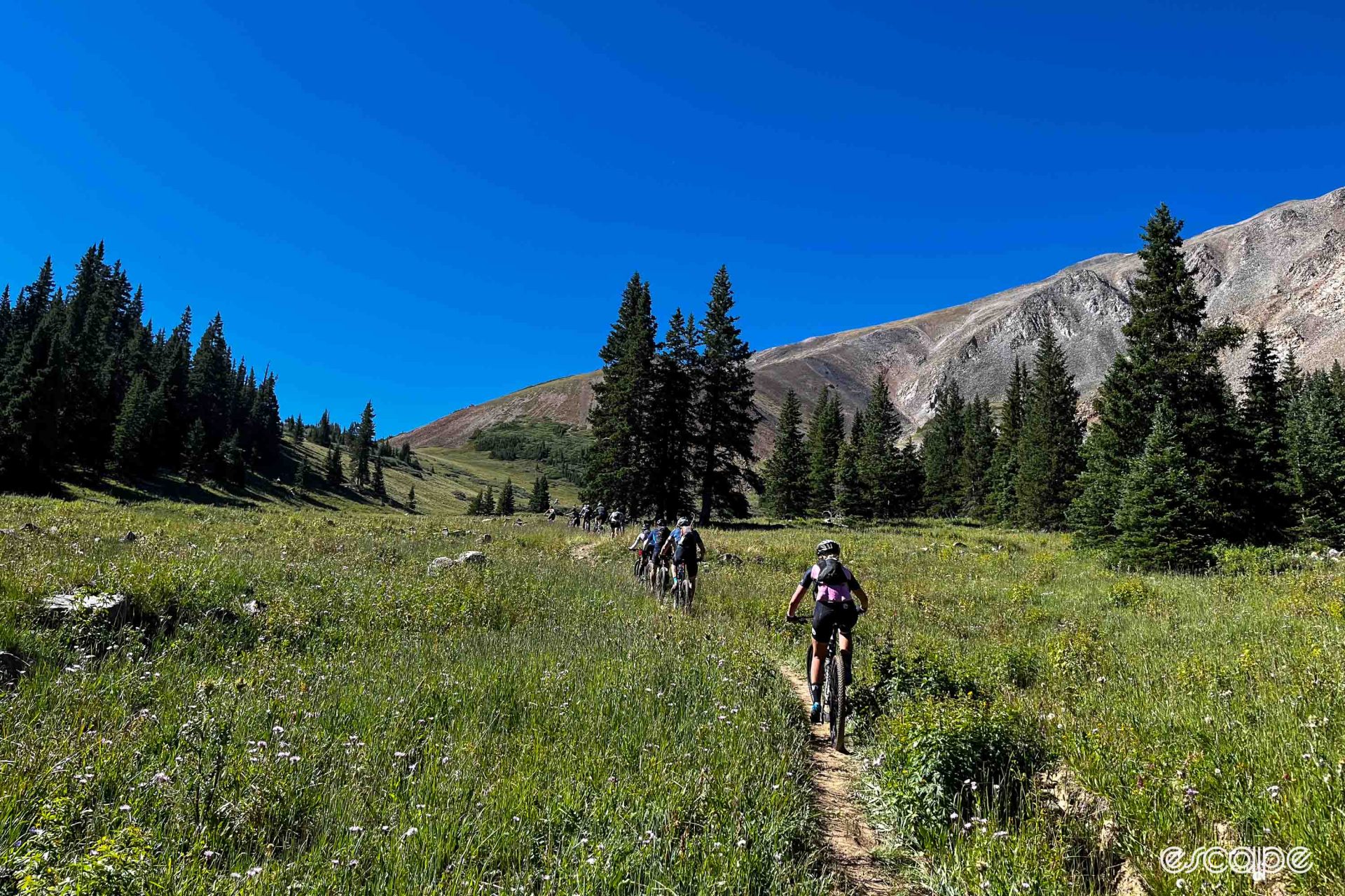 Mountain bikers climbing up French Pass in Colorado