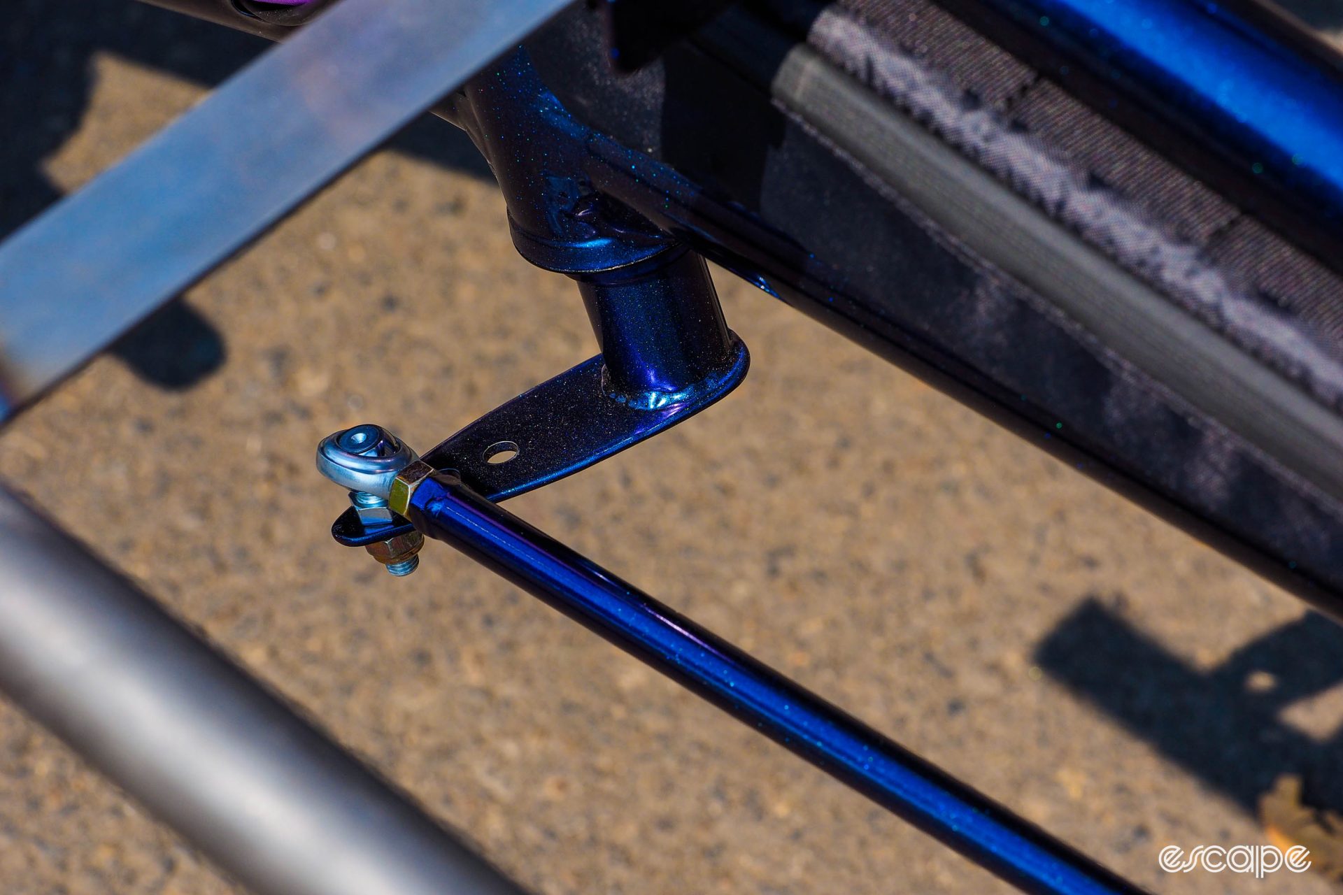 Matching blue linkage rod for the steering mechanism. 