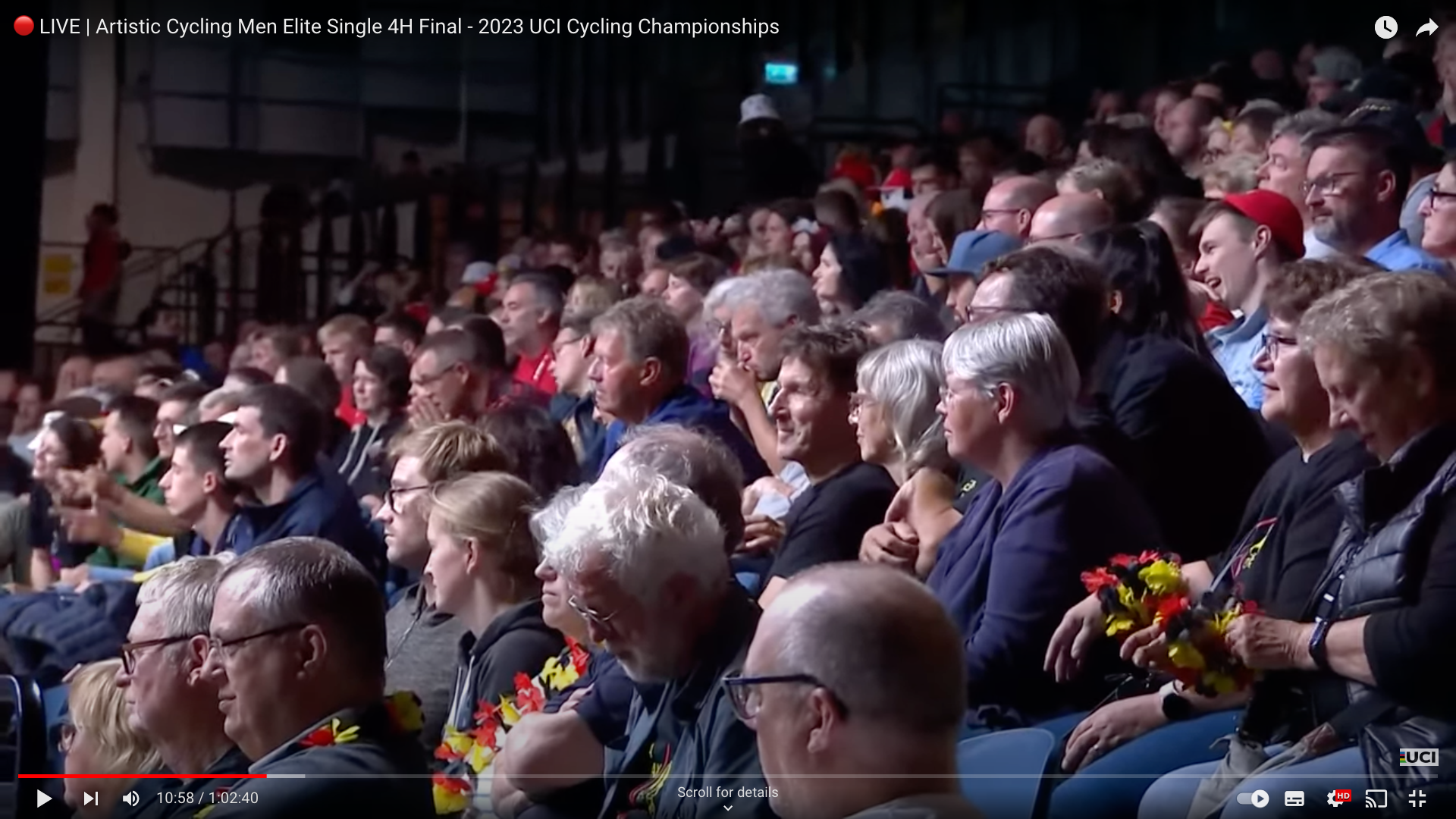Youtube screenshot of spectators, with German fans in foreground. 