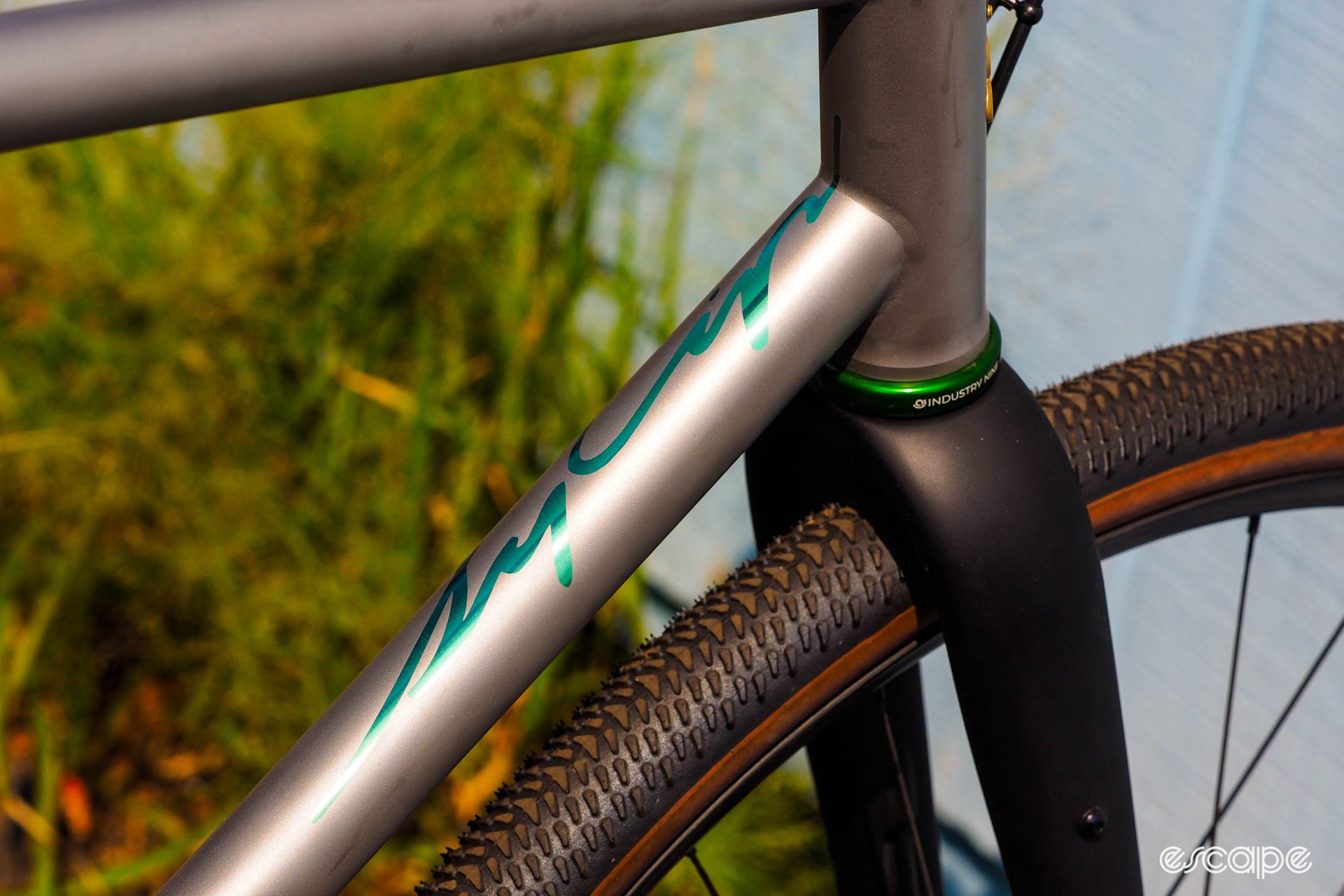 Green anodised logo on the top of the downtube.
