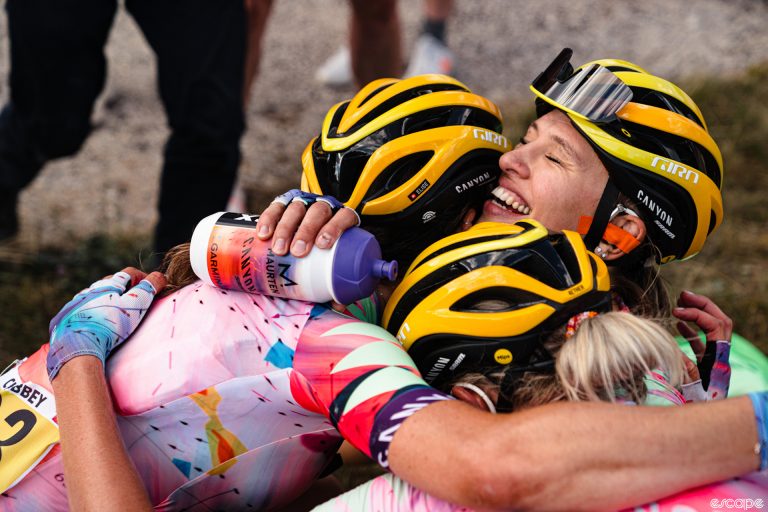 Canyon-SRAM embrace after the eighth stage of the Tour de France Femmes avec Zwift, 2023.