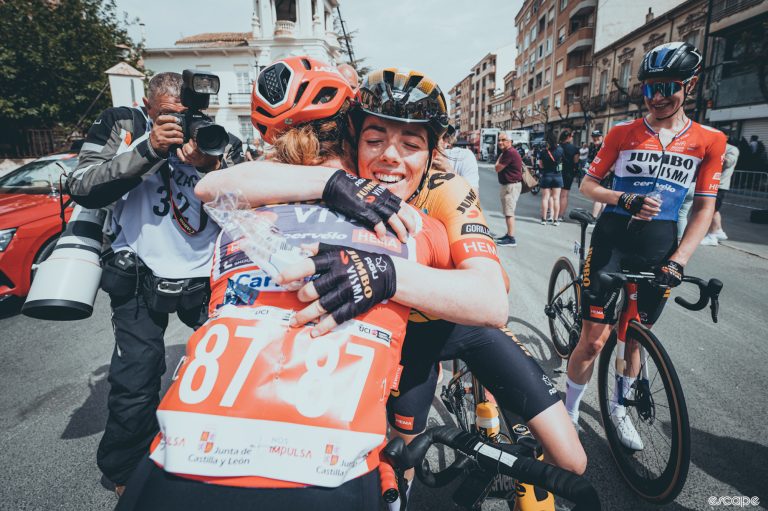Anna Henderson hugs Marianne Vos after the former won the third stage of La Vuelta Femenina, 2023.