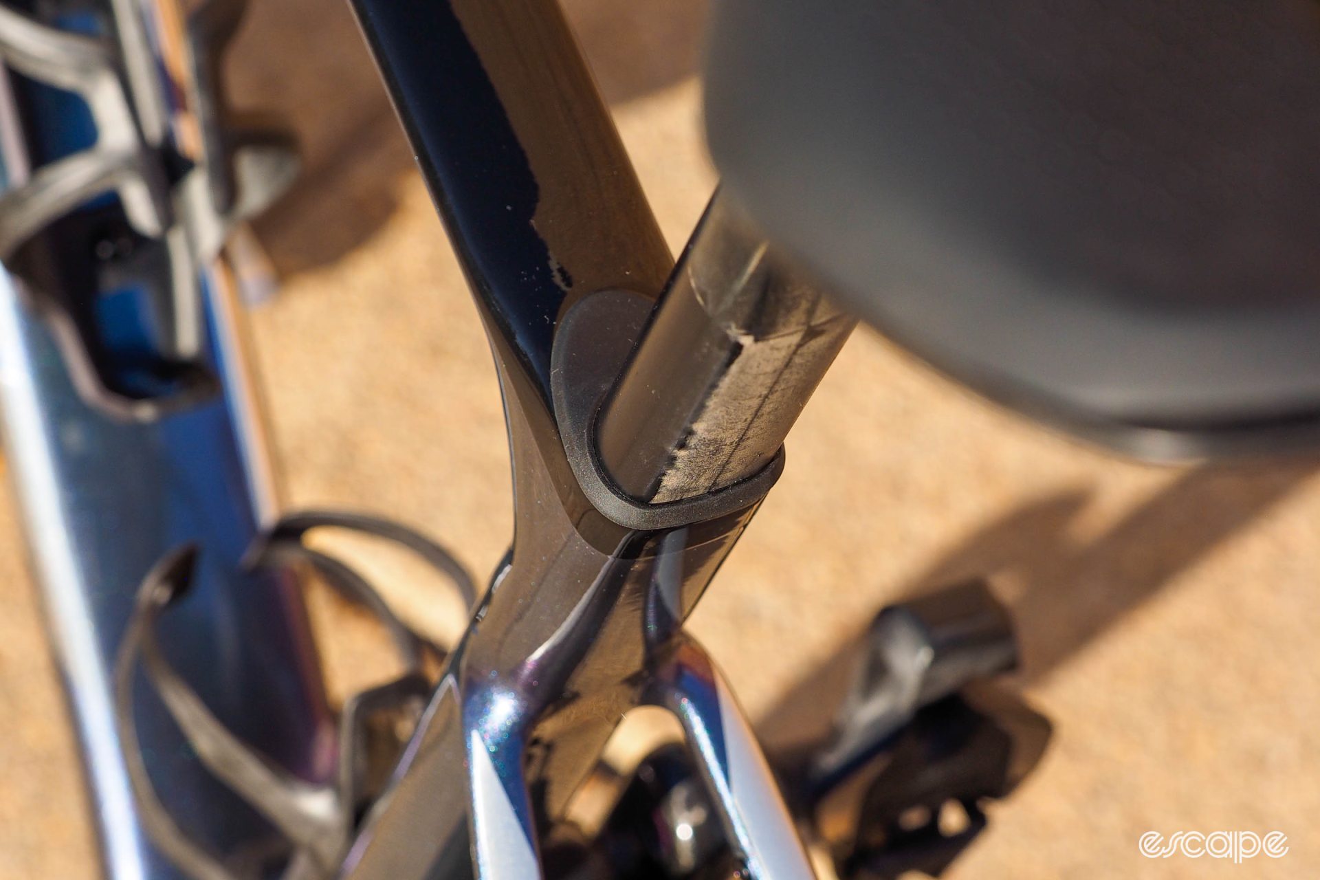 The d-shaped cross section of the D-Fuse seatpost is shown clearly here, with a rubber seal around the seatpost and clamp section.
