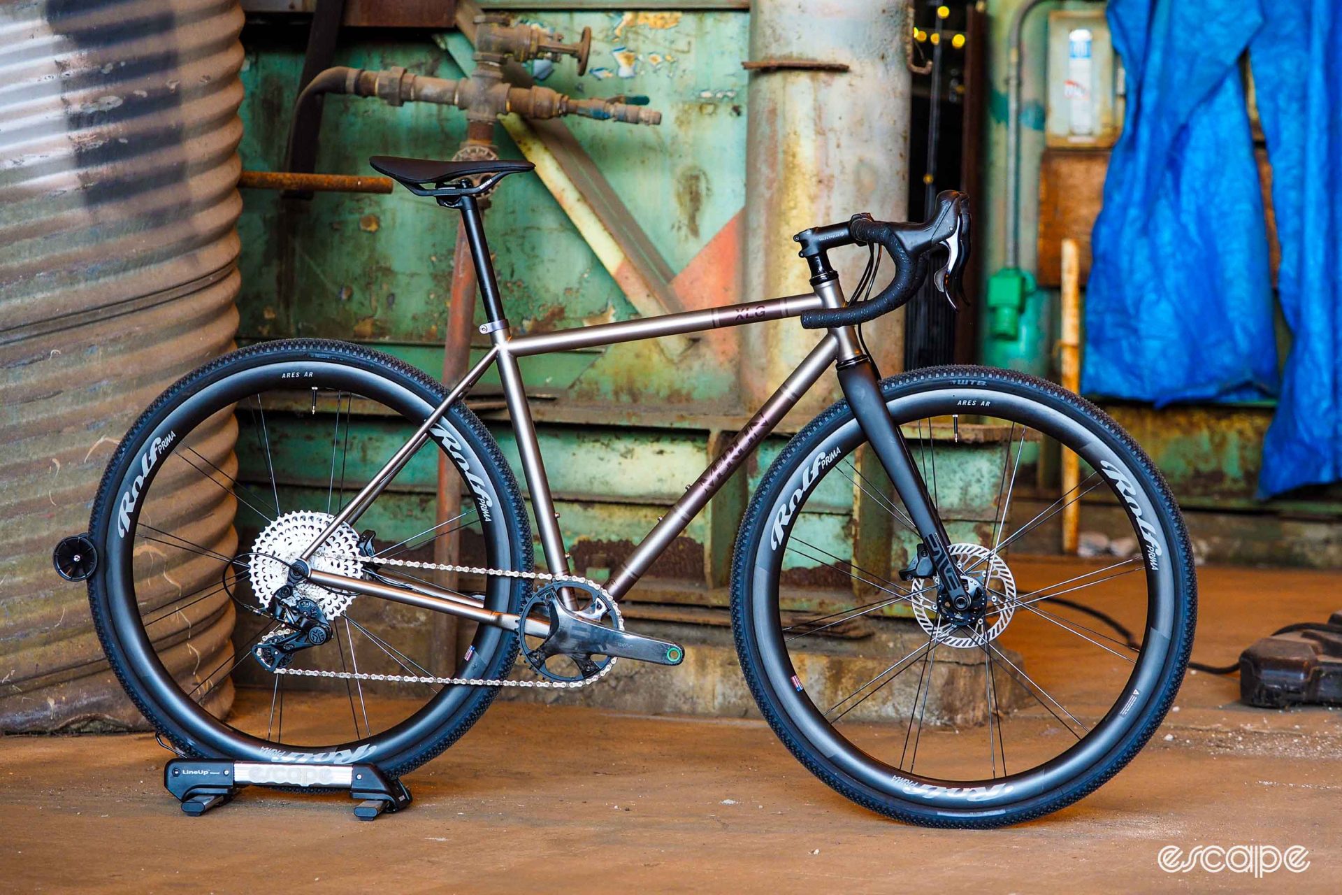 Side profile of Merlin Sandstone XLG titanium gravel bike.