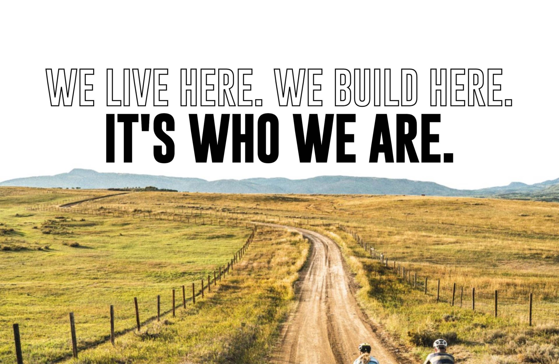 Graphic from the Moots web site with a picture of a dirt road through a field, with mountains in the background, and the marketing copy "We live here. We build here. It's who we are."
