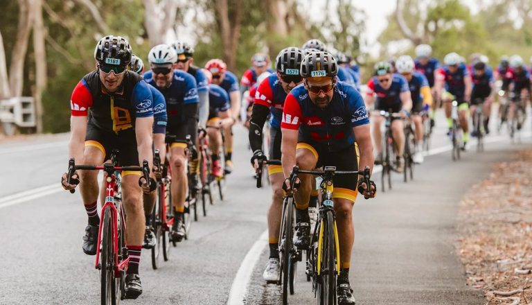 A peloton of recreational cyclists ride through the bush near Adelaide, Australia.