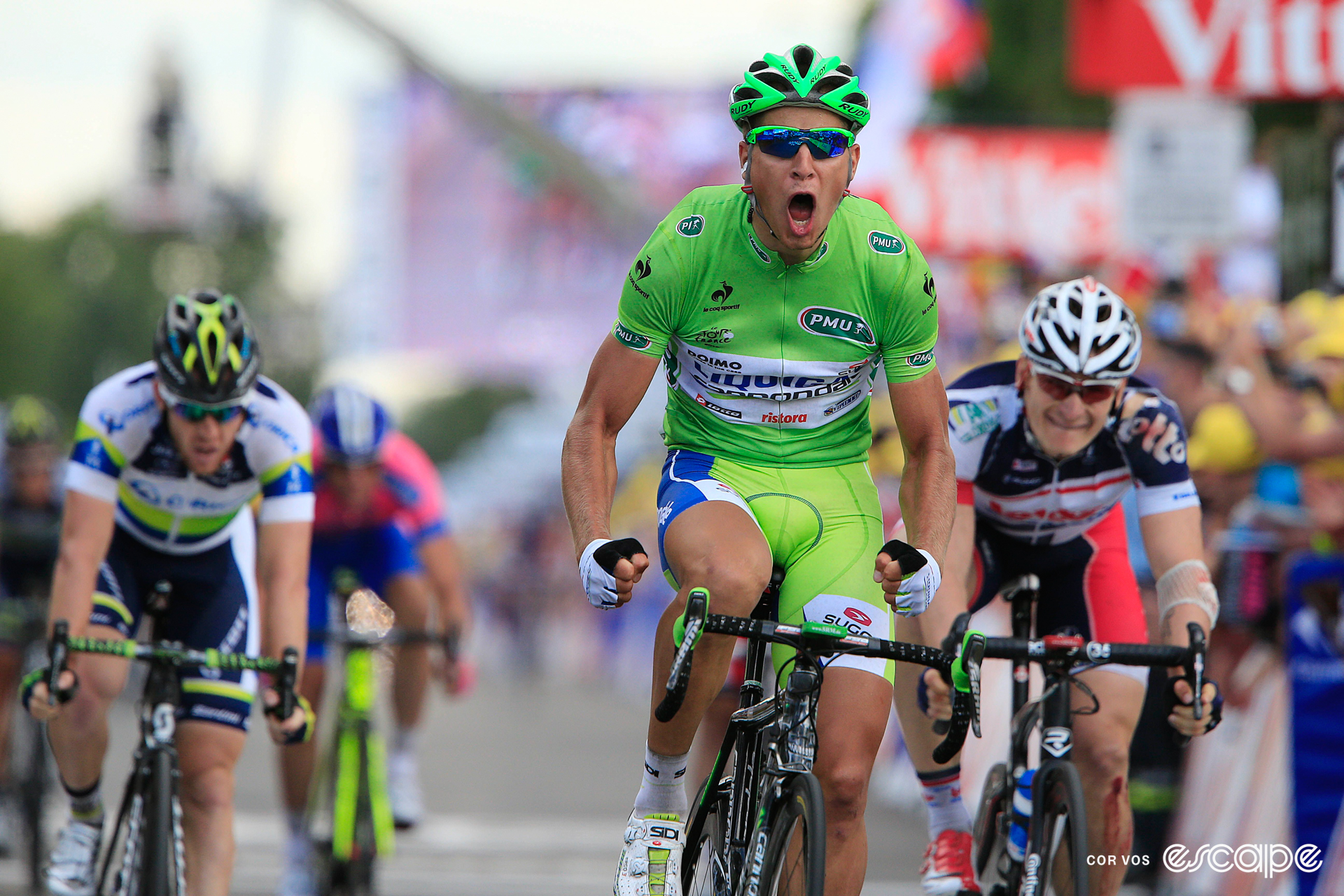 Peter Sagan celebrates winning a stage at the 2012 Tour de France with a loud yell of joy.