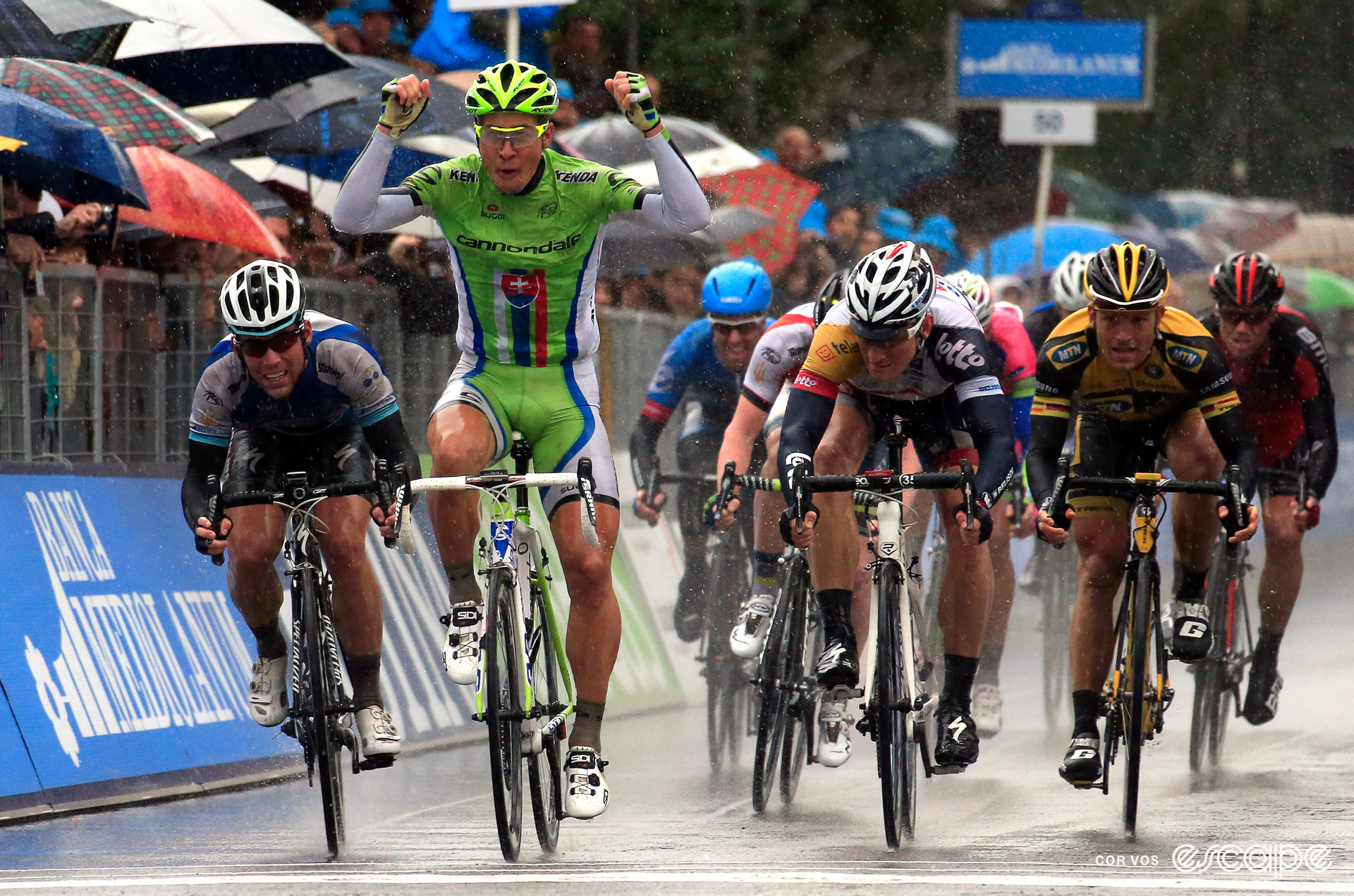 Peter Sagan celebrates winning a stage at the 2013 Tirreno-Adriatico, in heavy rain.