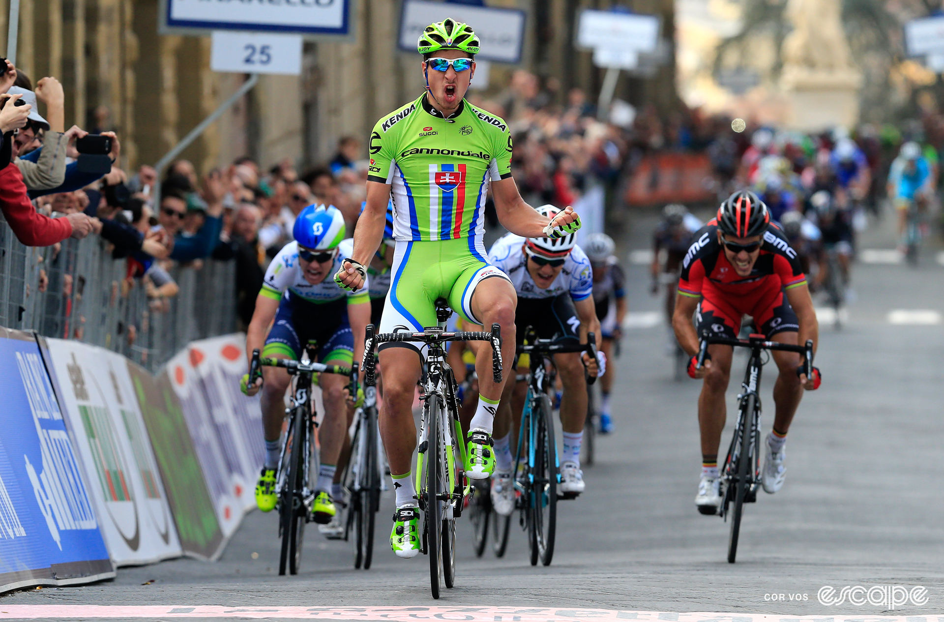 Peter Sagan celebrates winning a stage at the 2014 Tirreno-Adriatico with a delighted yell and double fist-pump.