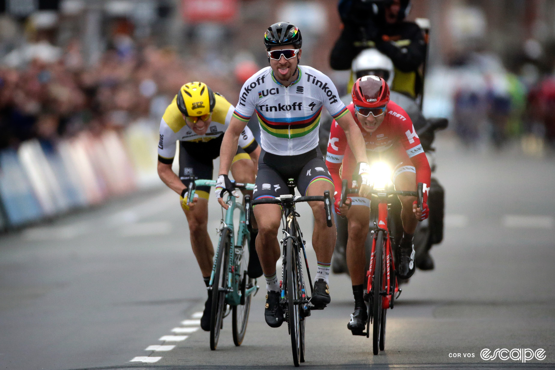 Peter Sagan celebrates winning the 2016 Gent-Wevelgem with his tongue out.