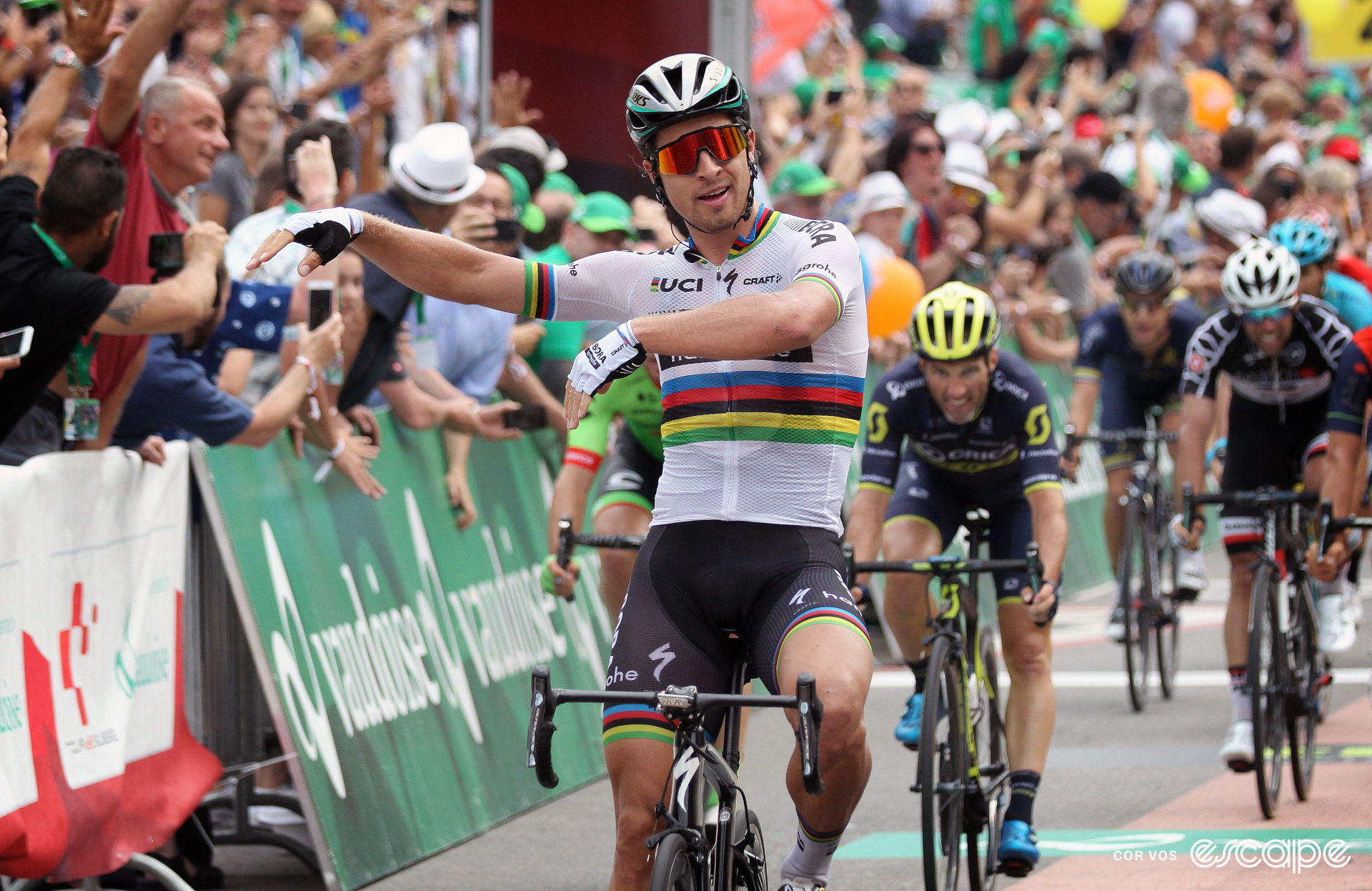 Peter Sagan celebrates winning a stage at the 2017 Tour de Suisse, with two arms out to his right-hand side.