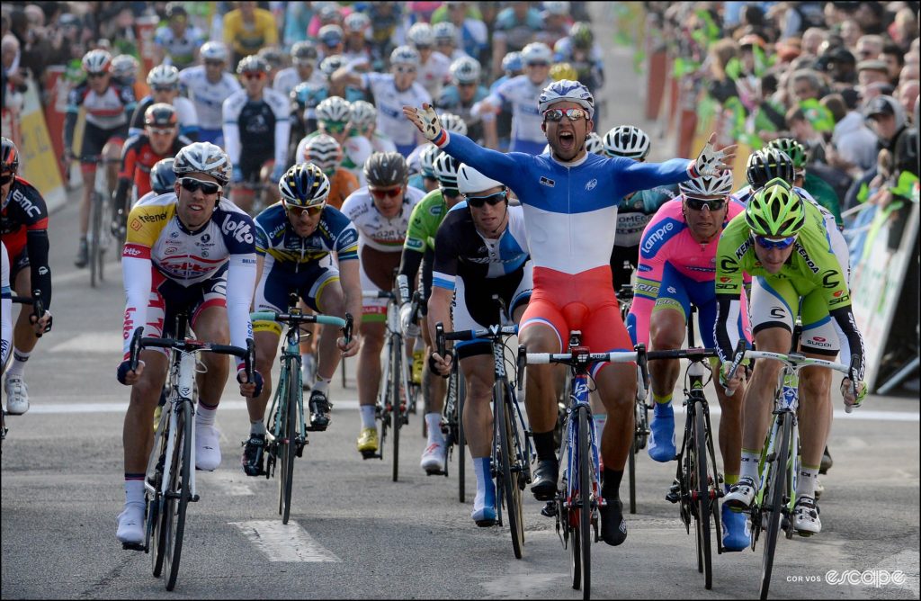 Nacer Bouhanni narrowly wins a stage of Paris-Nice, exclaiming in delight. 