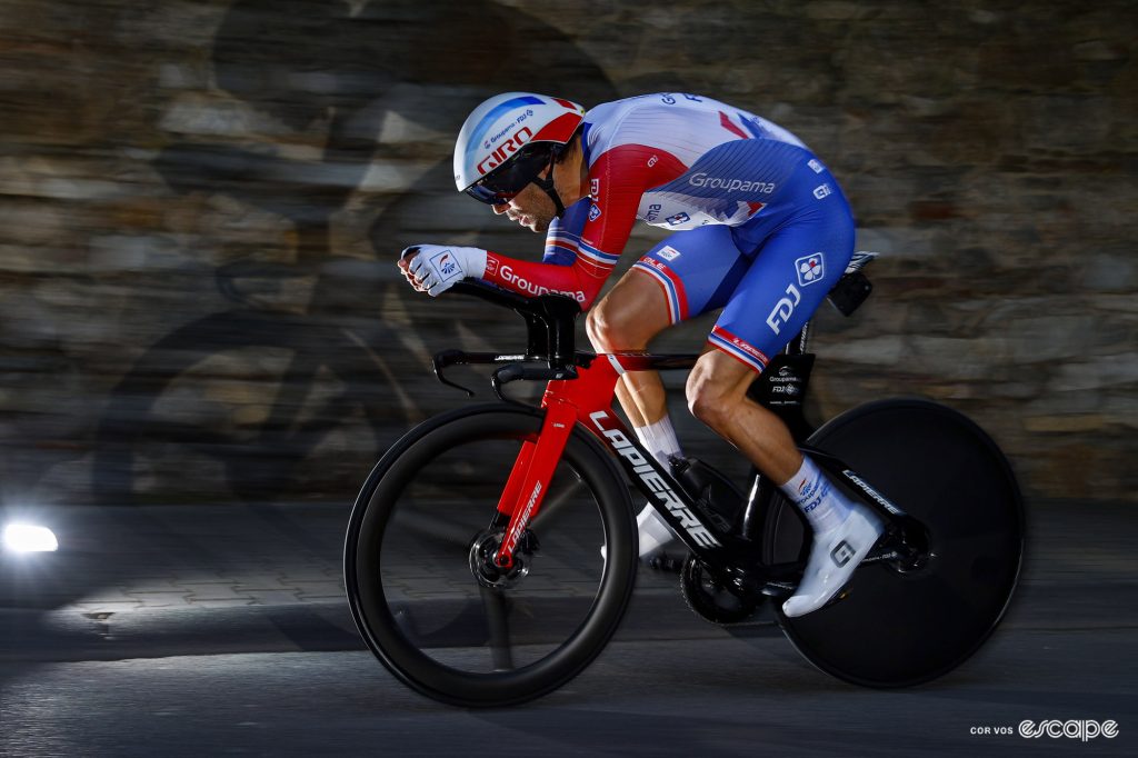 Pinot whooshes along on a TT bike. 