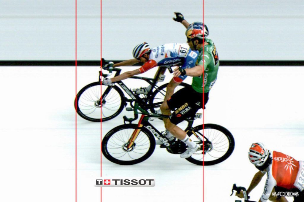 Photo finish shot of the end of the race, showing Gaudu's remarkable throw of the bike. 