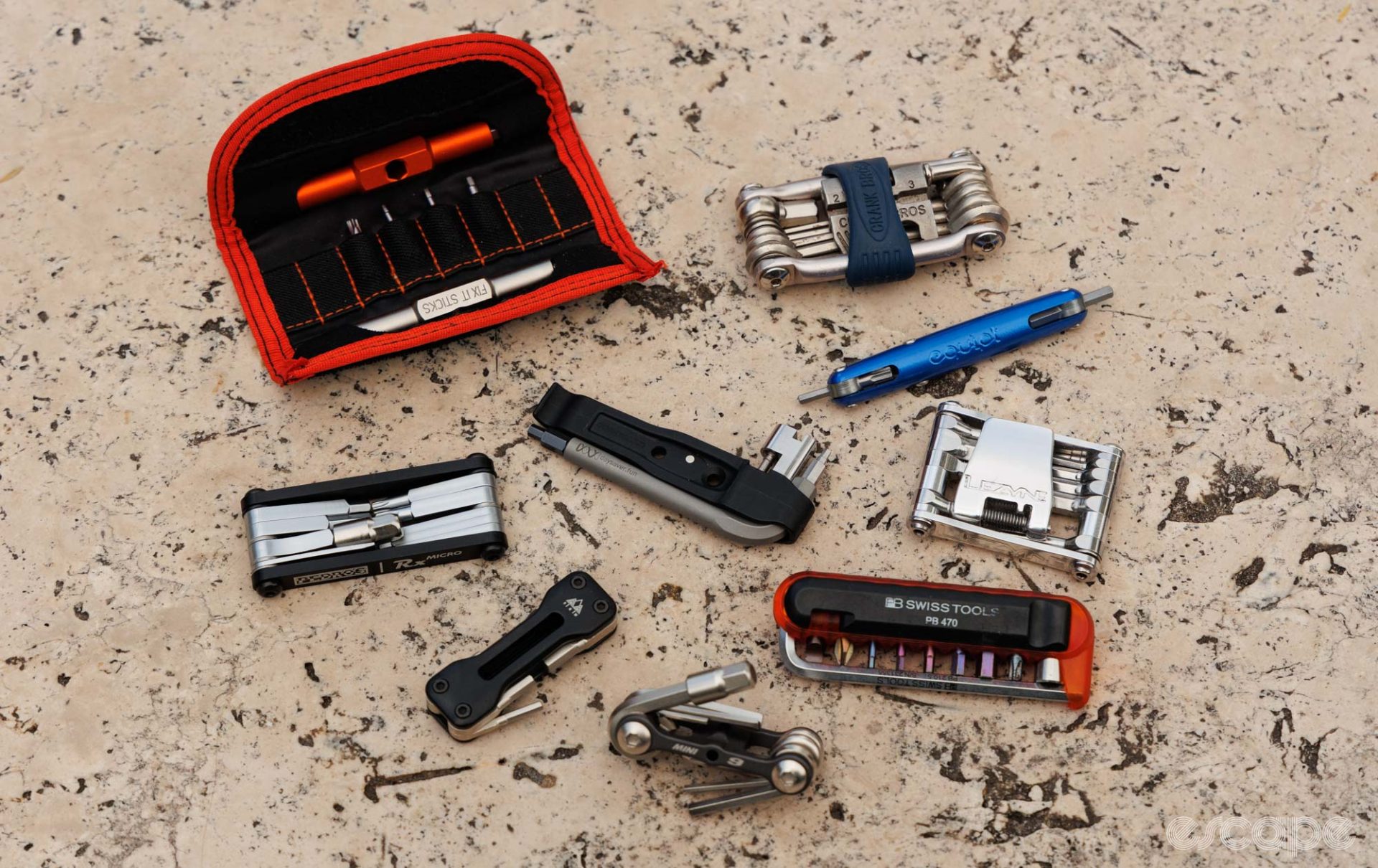 A handful of bicycle multitools with the Daysaver in the middle. 