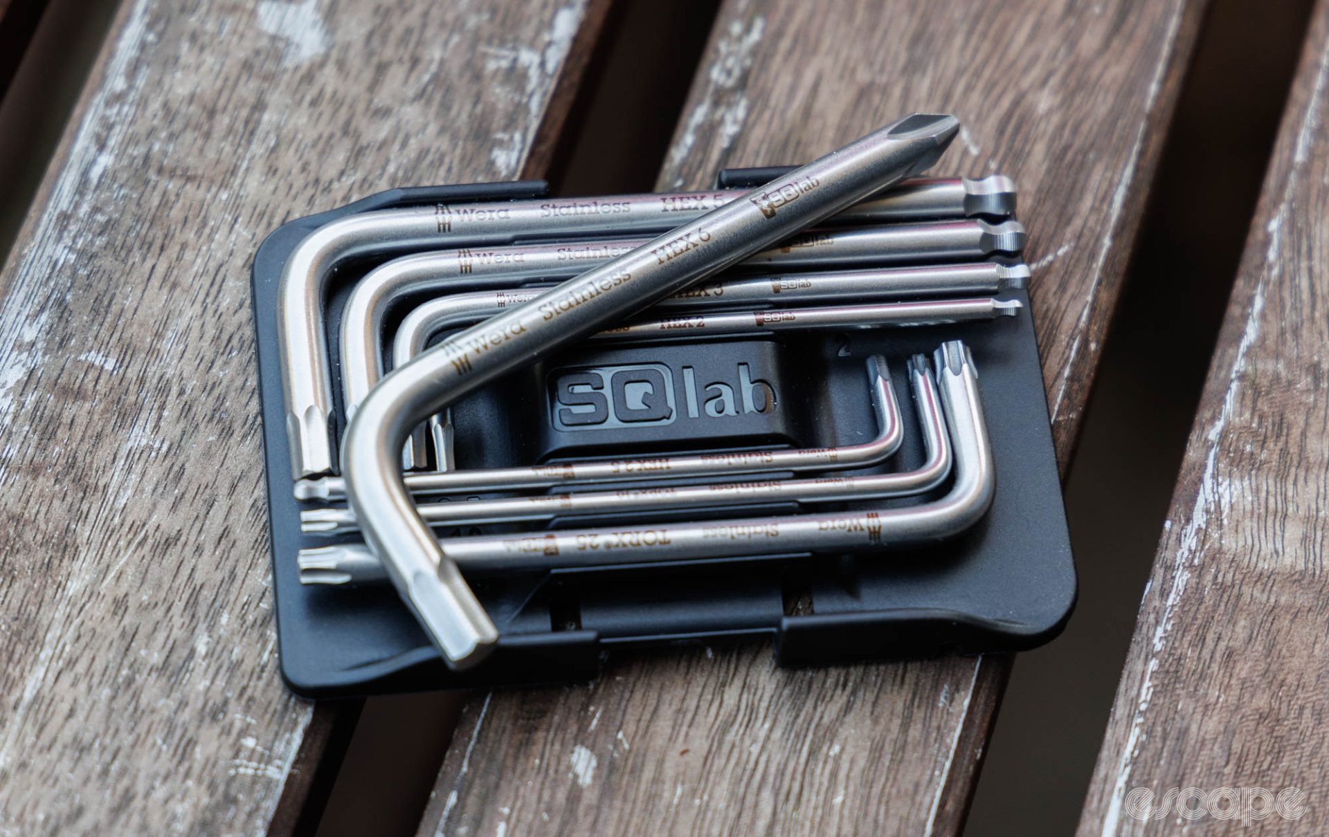 A close up showing the SQLabs holding case, and the biggest tool of the set. 