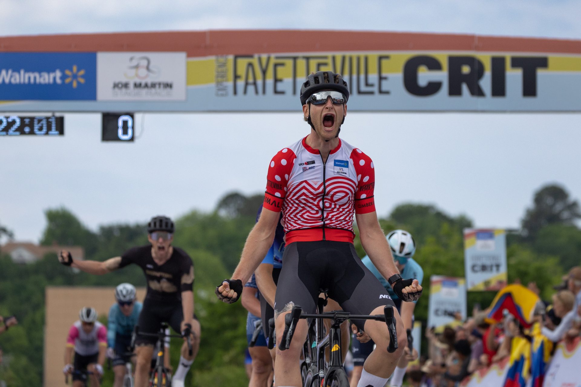 Riley Sheehan celebrates a stage win at the 2023 Joe Martin Stage race.