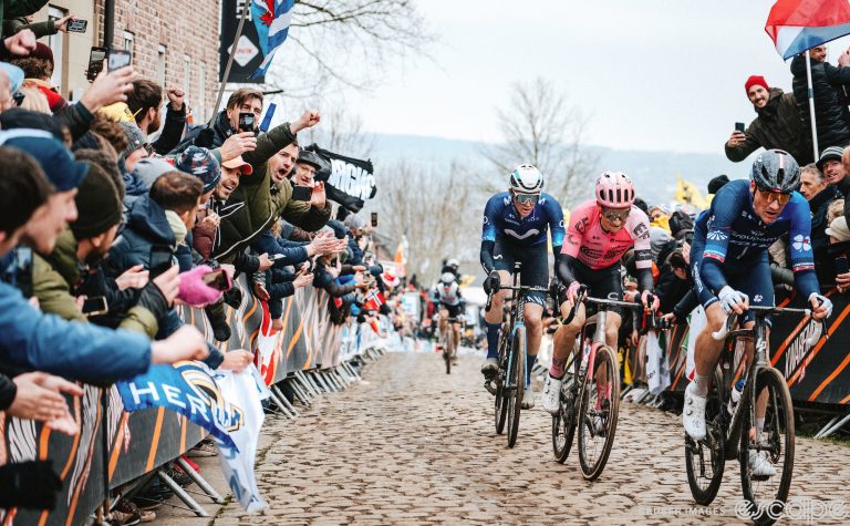 Stefan Küng, Neilson Powless, and Matteo Jorgenson climb the cobbles on the Oude Kwaremont at the 2023 Tour of Flanders.