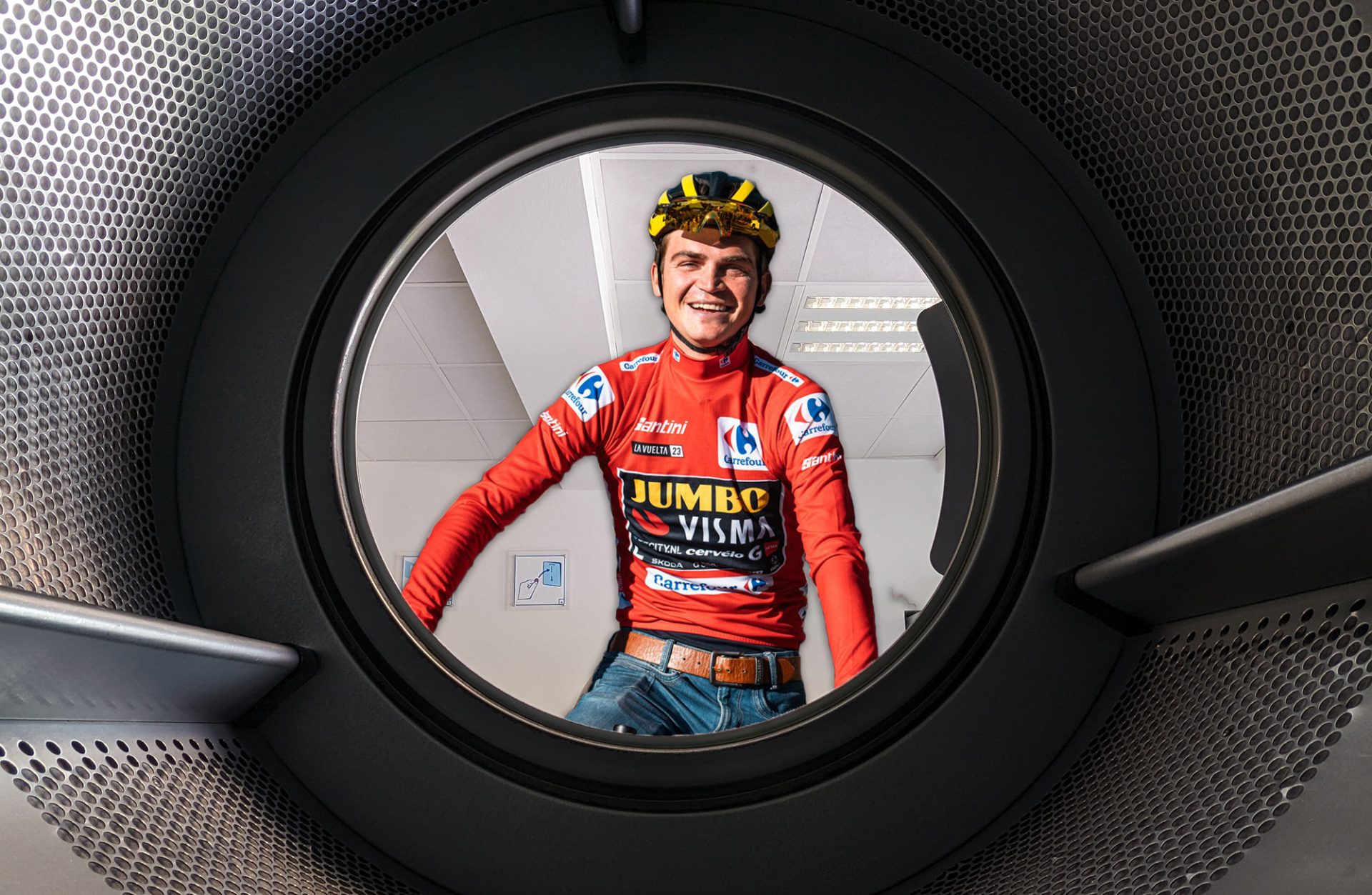 Sepp Kuss inside a washing machine drum.