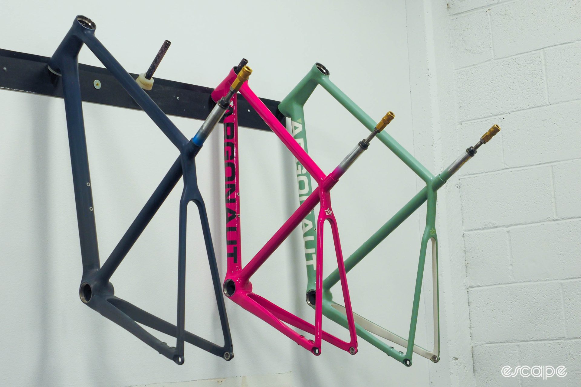 Argonaut Cycles finished frames hanging on wall