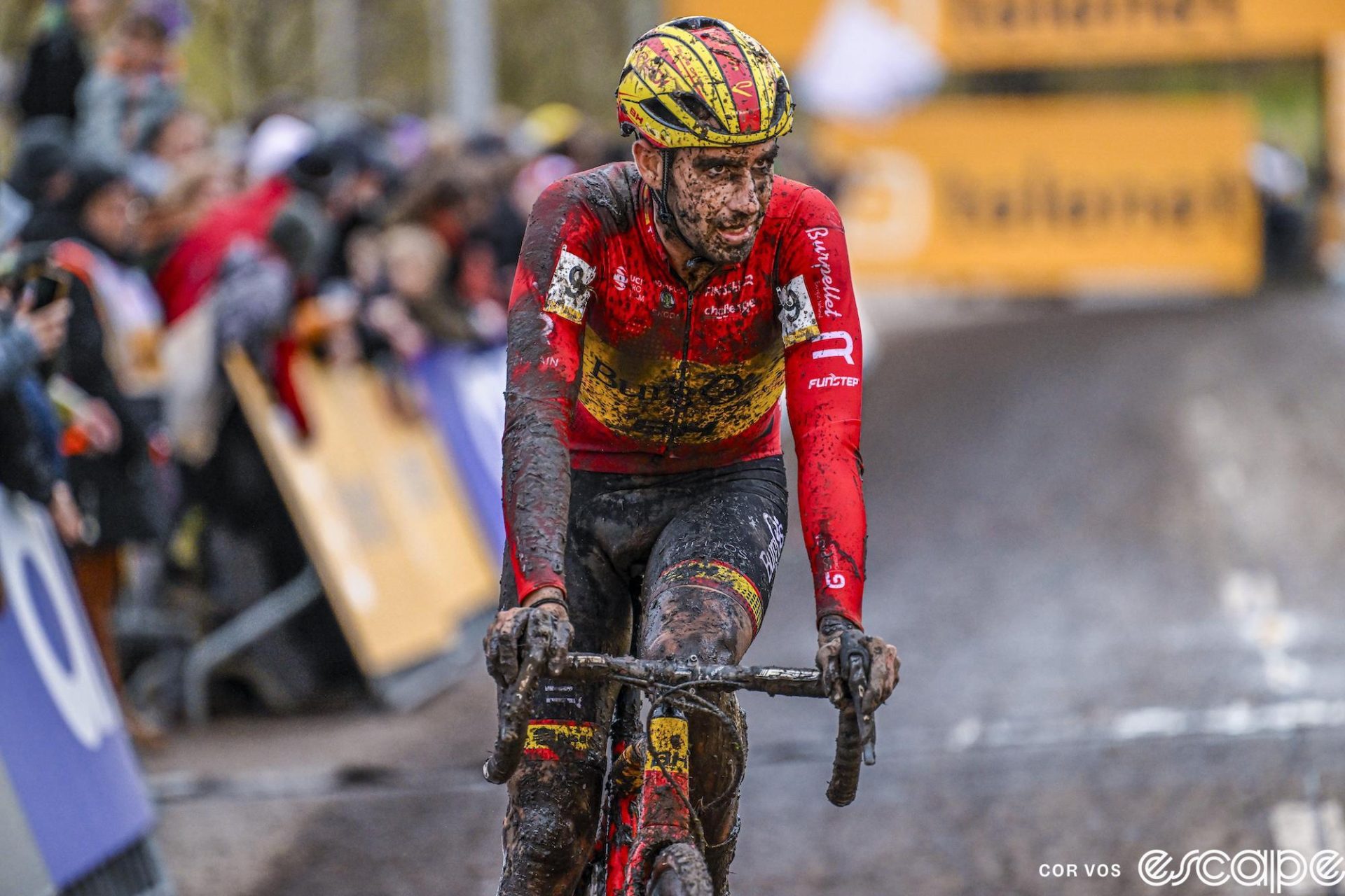 Felipe Orts finishes the Niel round of the Superprestige. He's also covered in mud and looks kinda shocked, thousand-yard-stare.