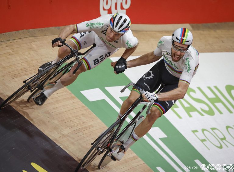 Yoeri Havik and Jan-WIllem Van Schip exchange a handsling during one of the Madison races at the recent Gent Six Day event.