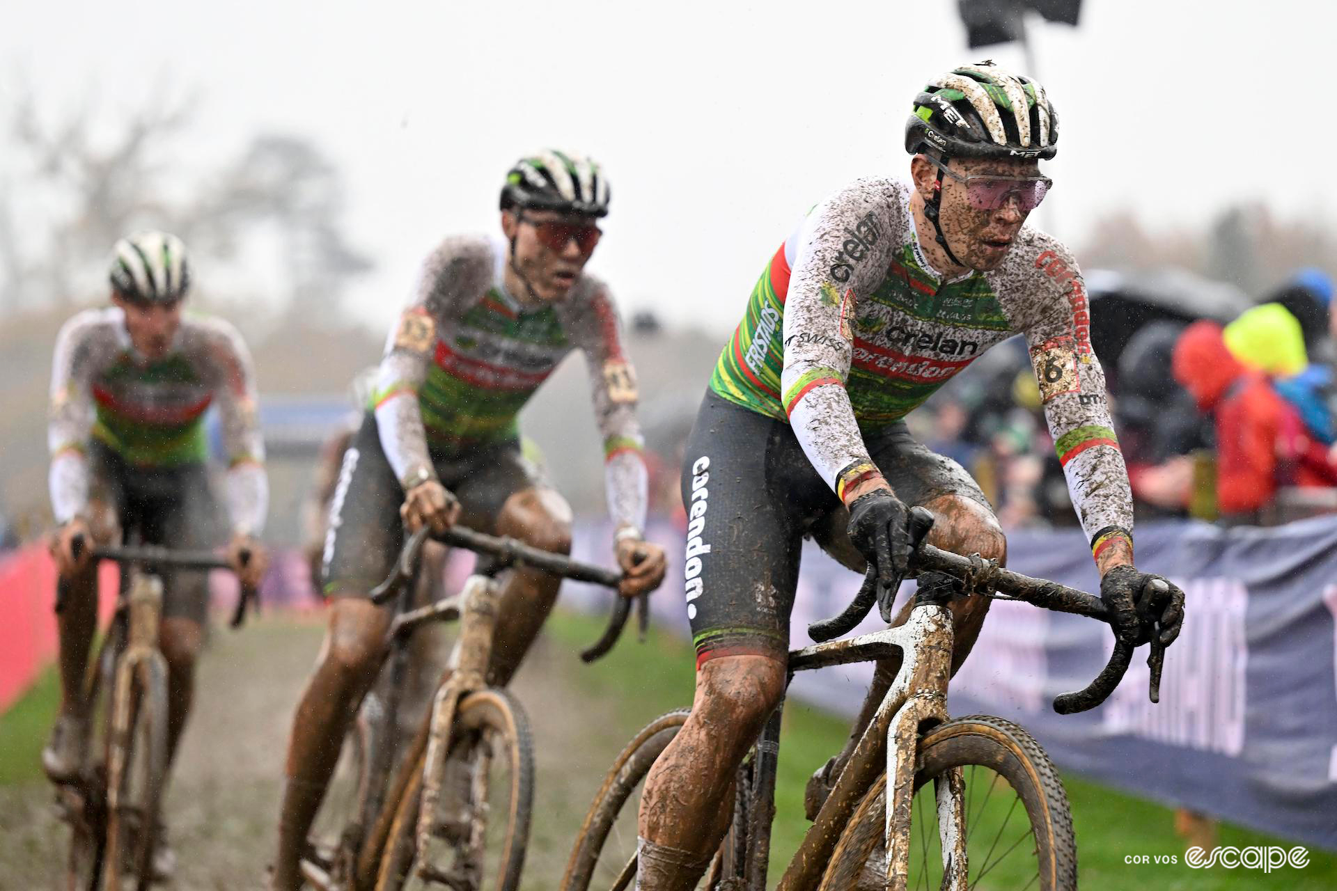 Laurens Sweeck is the first in a line of three Crelan-Corendon riders, all of them splashed with mud, early in CX World Cup Dublin.