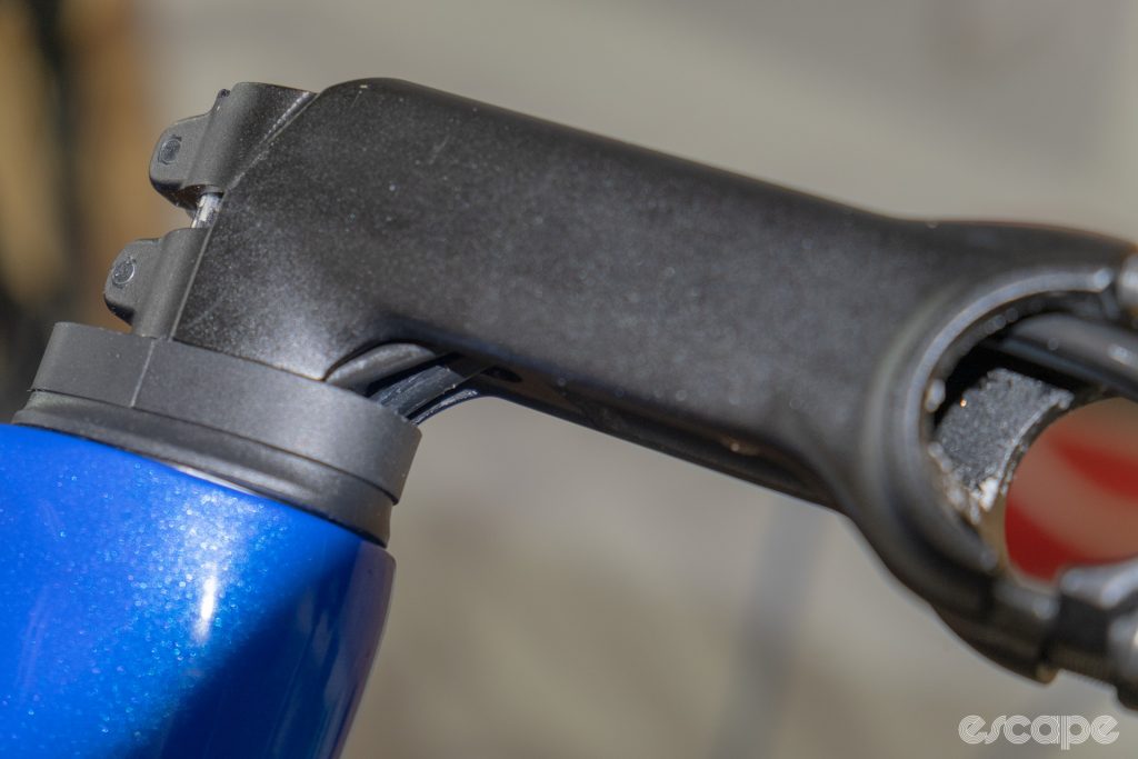 The photo shows the brake hose routing through and under the Conceal stem and into the headset on a new Cannondale SuperSix Evo Hi-Mod 2.