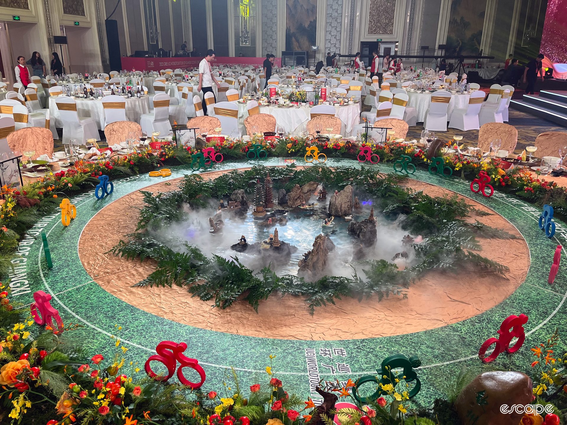 The top dinner table of the Tour of Guangxi featuring figurines in smoky water as the centrepiece.