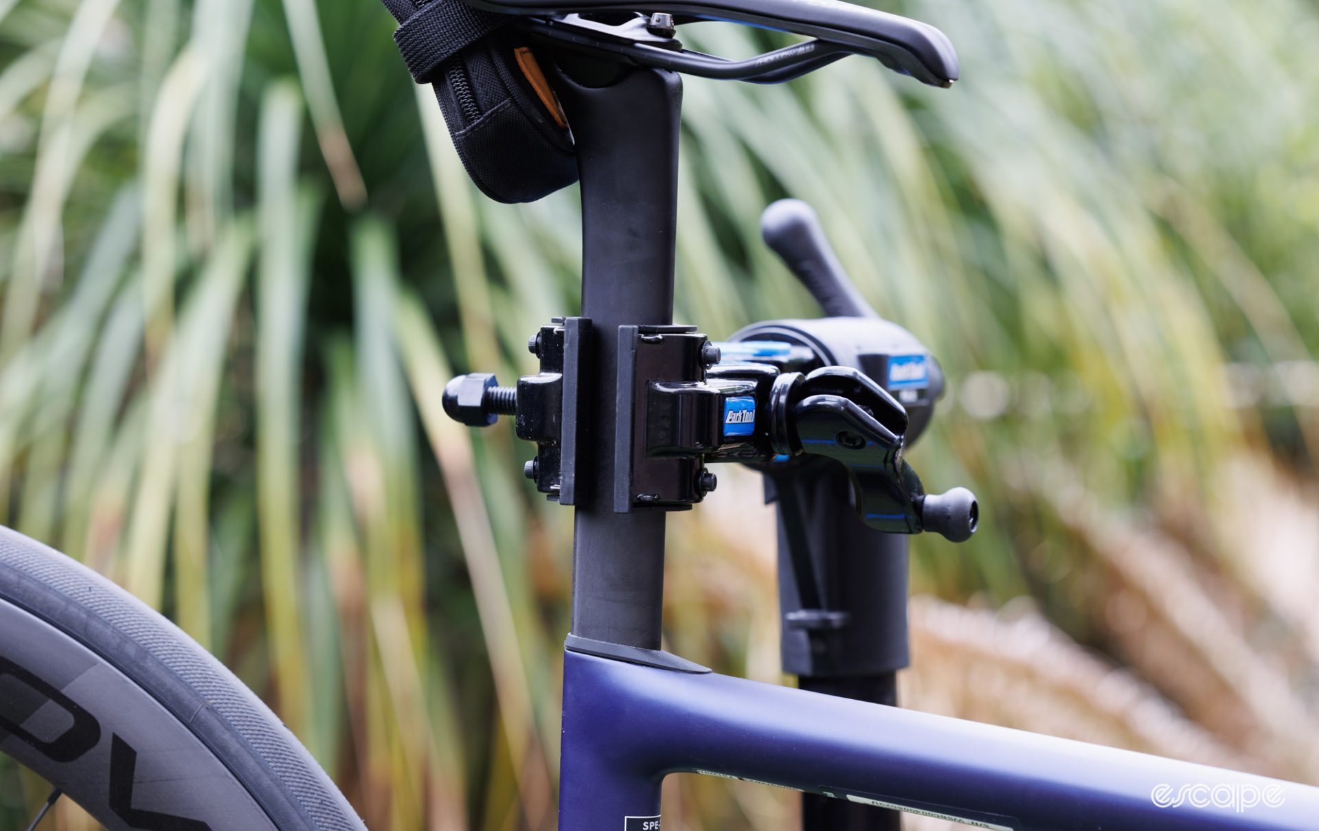 Park Tool clamp holding a Specialized Tarmac SL8 seat post. 