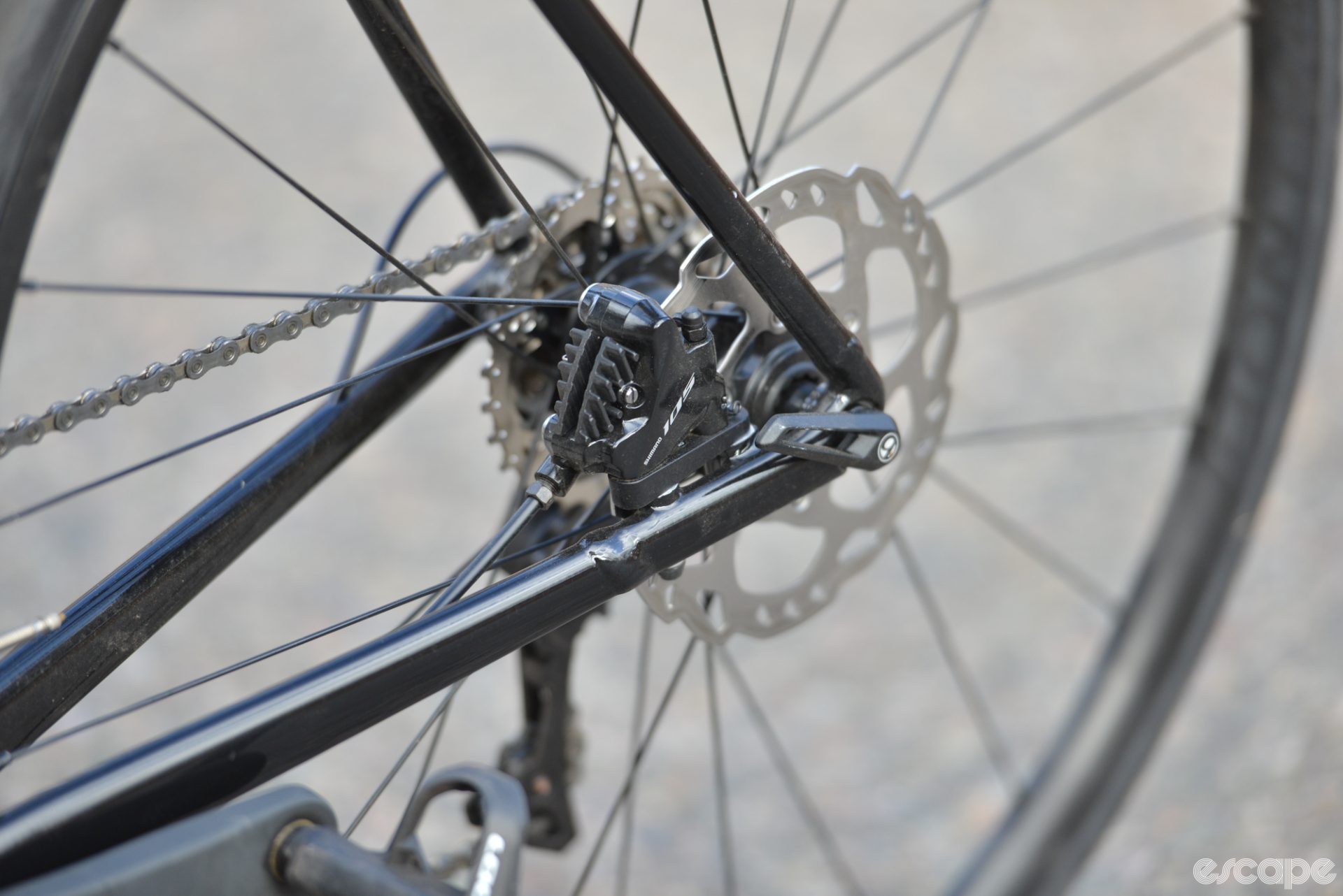 The rear triangle of the Emonda ALR, showing a welded, reinforced chainstay for the flat-mount disc brake caliper.