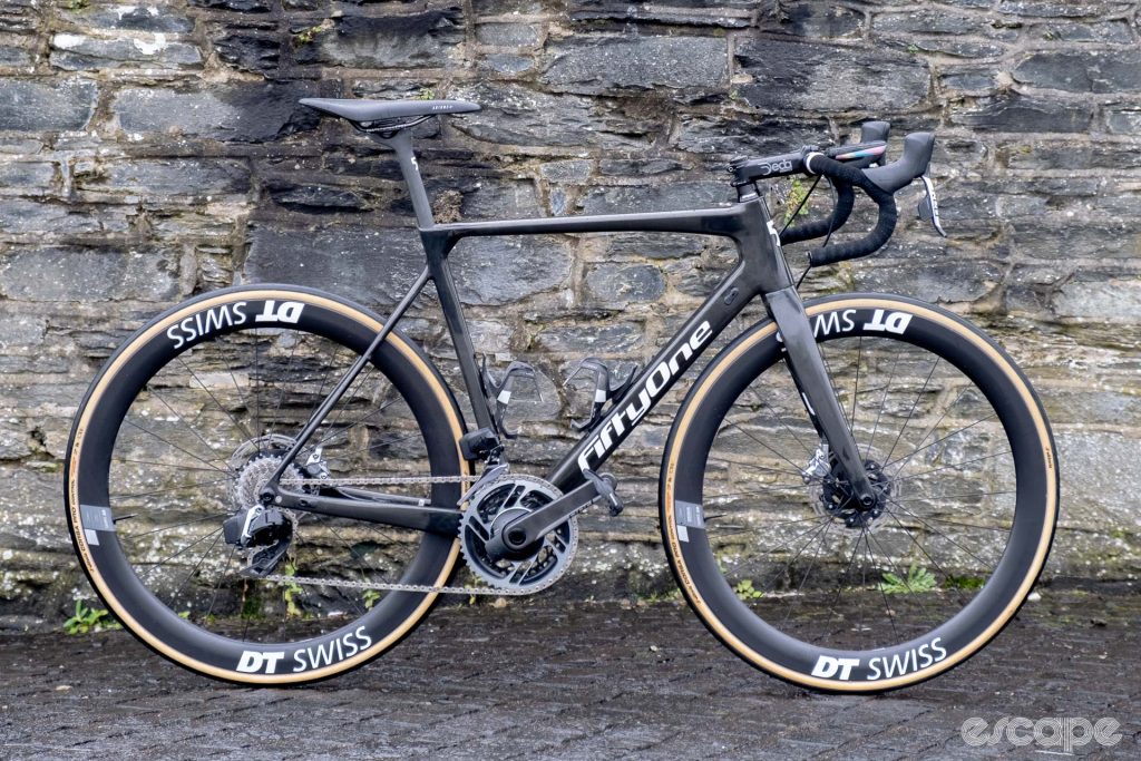 The photo shows Yakob Debesay's FiftyOne bike side on with a stone wall background 