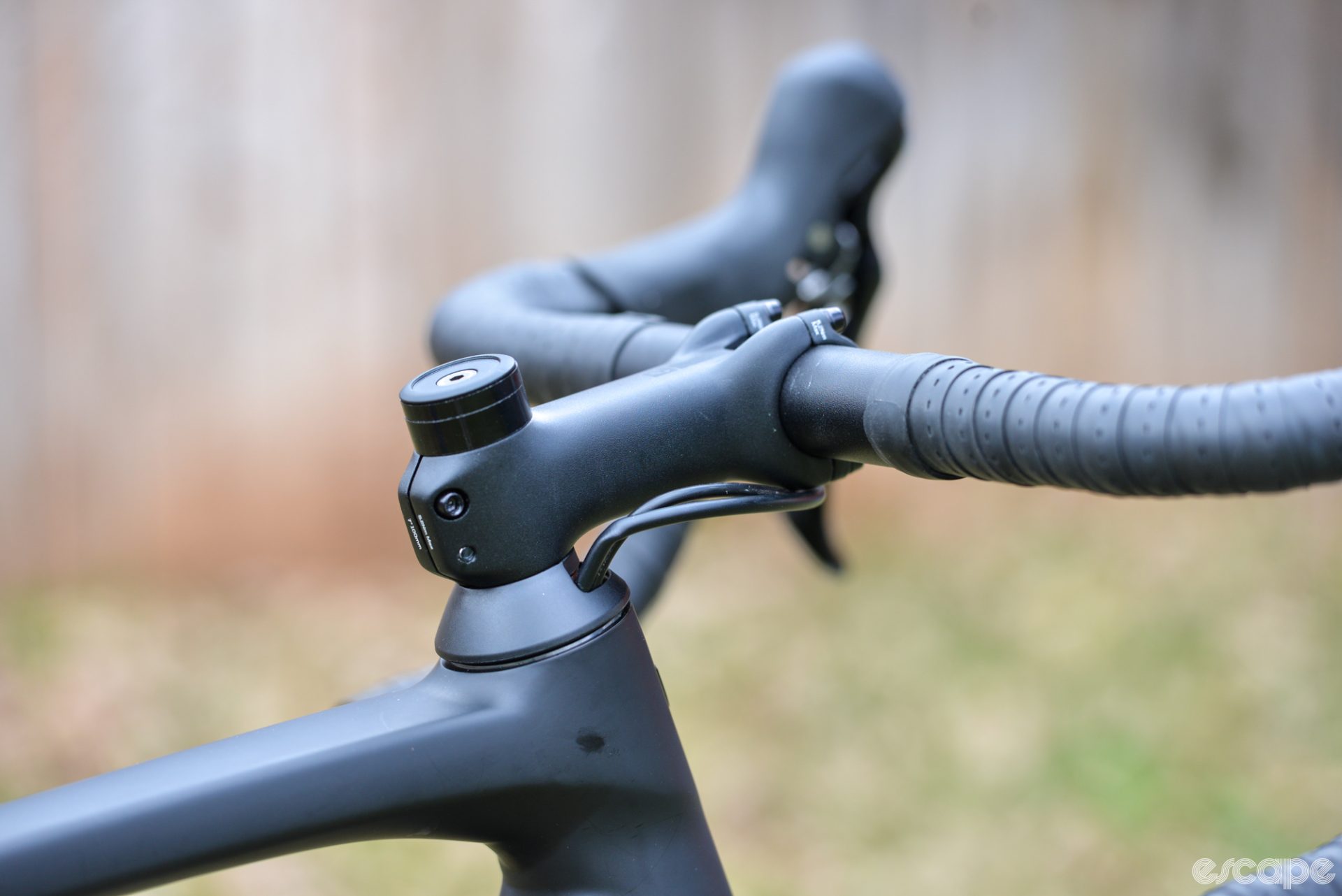 The close-to-internal routing shows a kink in the hydraulic brake line for the rear brake as it enters the headset top cap.