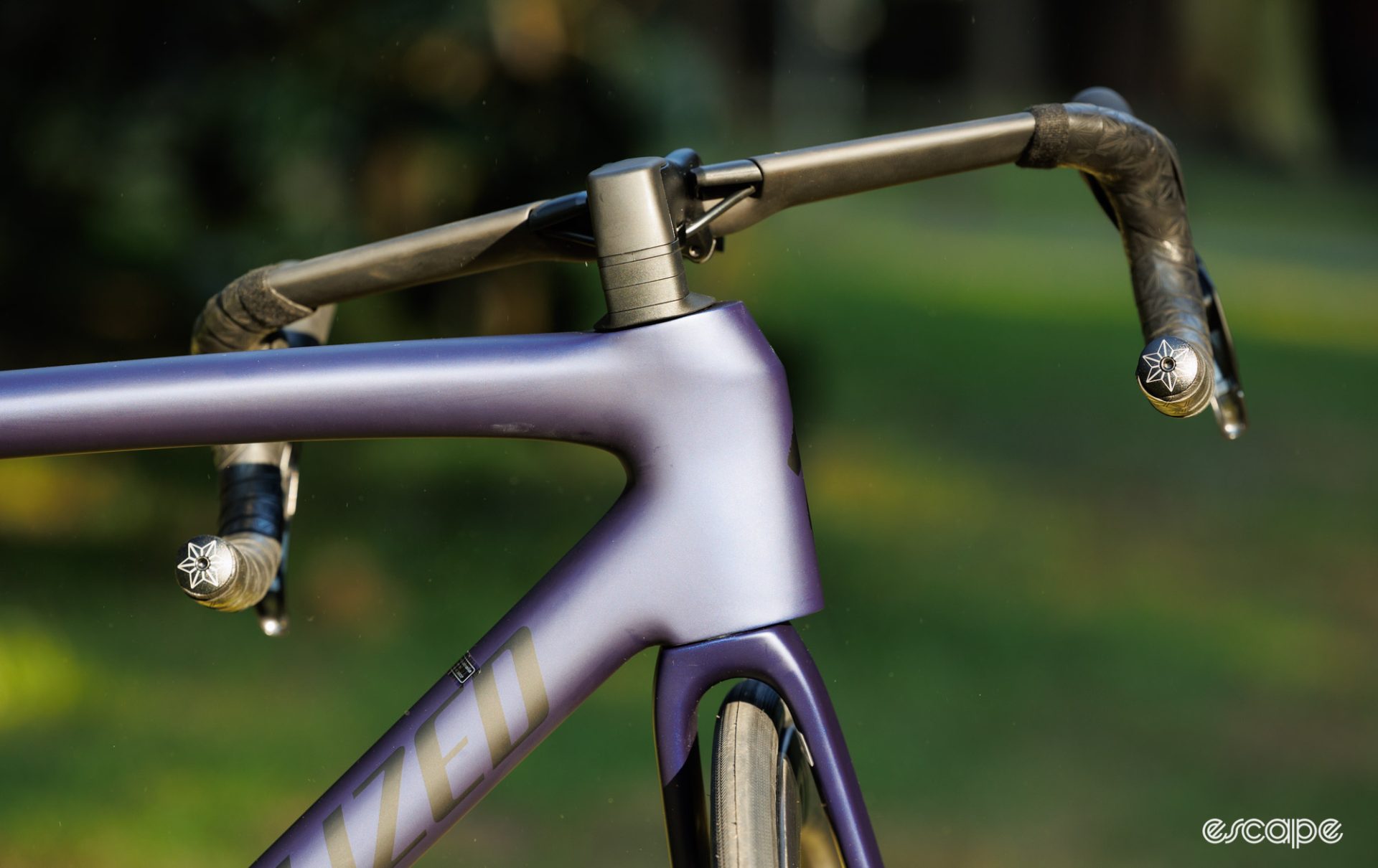 A photo with the handlebars turned to show the shape of the head tube. 