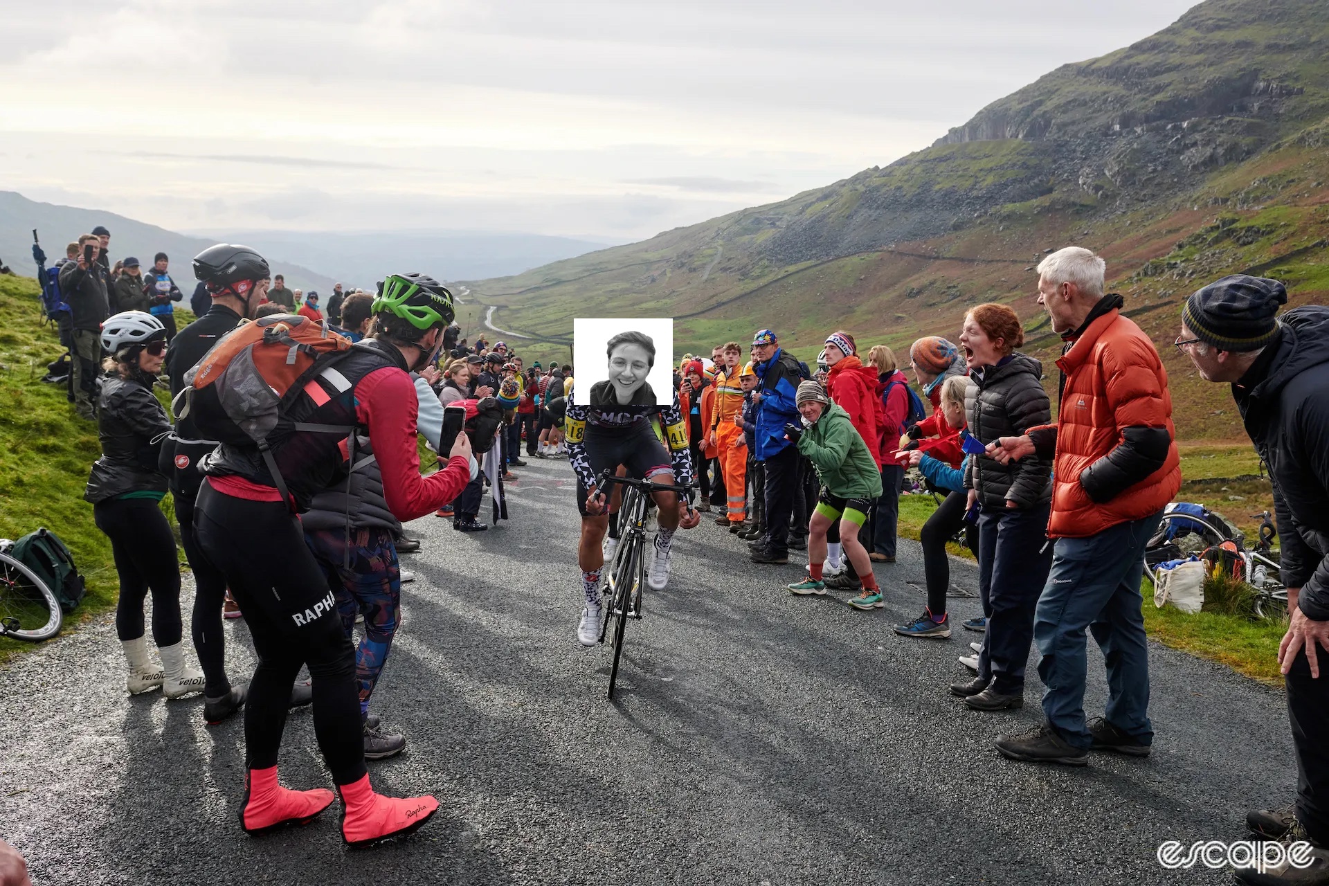 A rider in the UK Hill Climb championships rides up The Struggle. Kit Nicholson's smiling mug is implausibly, crappily Photoshopped over the rider's.
