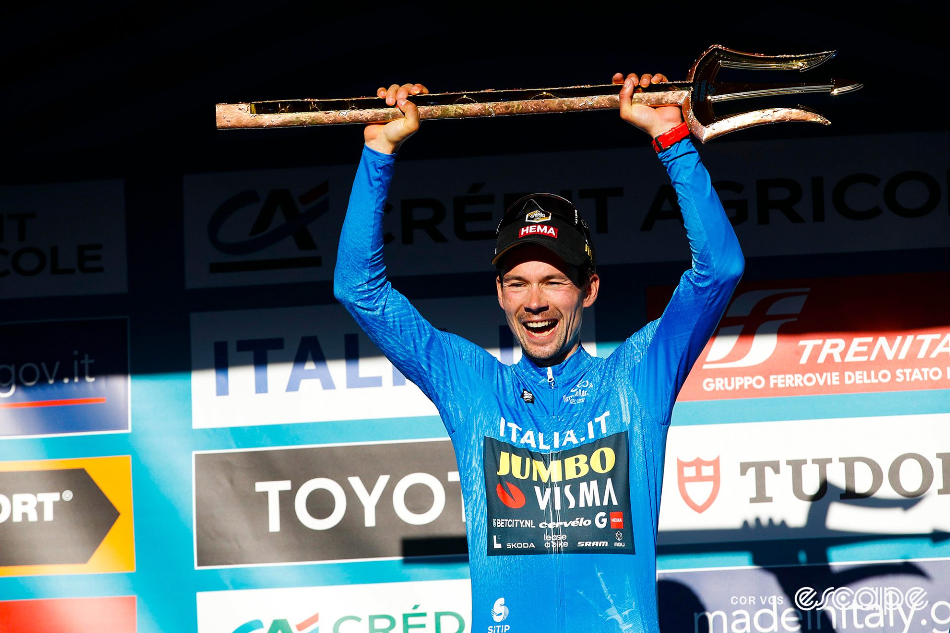 Primož Roglič on the winner's podium at Tirreno-Adriatico.