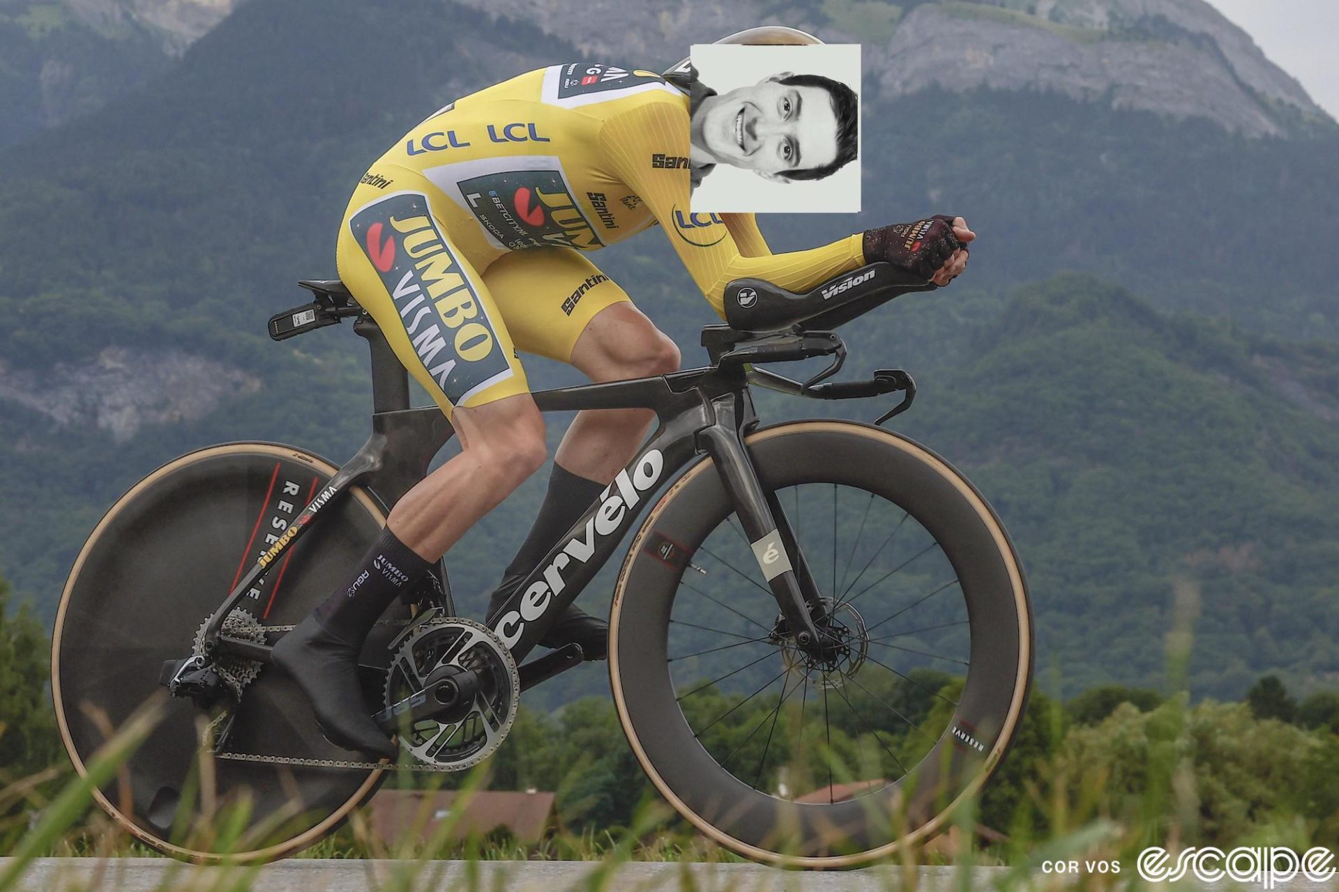 Jonas Vingegaard time trials on stage 16 of the 2023 Tour de France. Ronan Mc Laughlin's head shot is crudely photoshopped in place of Jonas' face, with Ronan's head facing sideways.