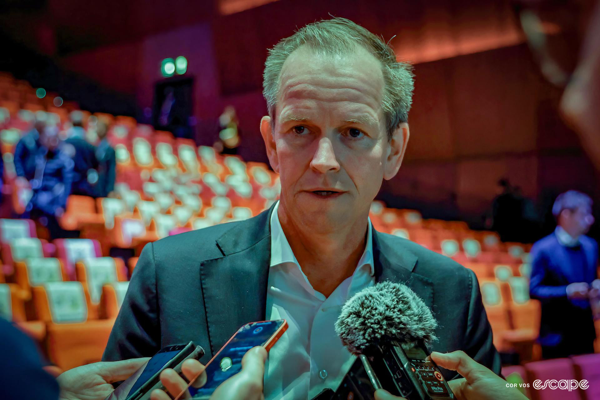 Jumbo-Visma CEO Richard Plugge being interviewed at the end of the 2024 Tour de France presentation.