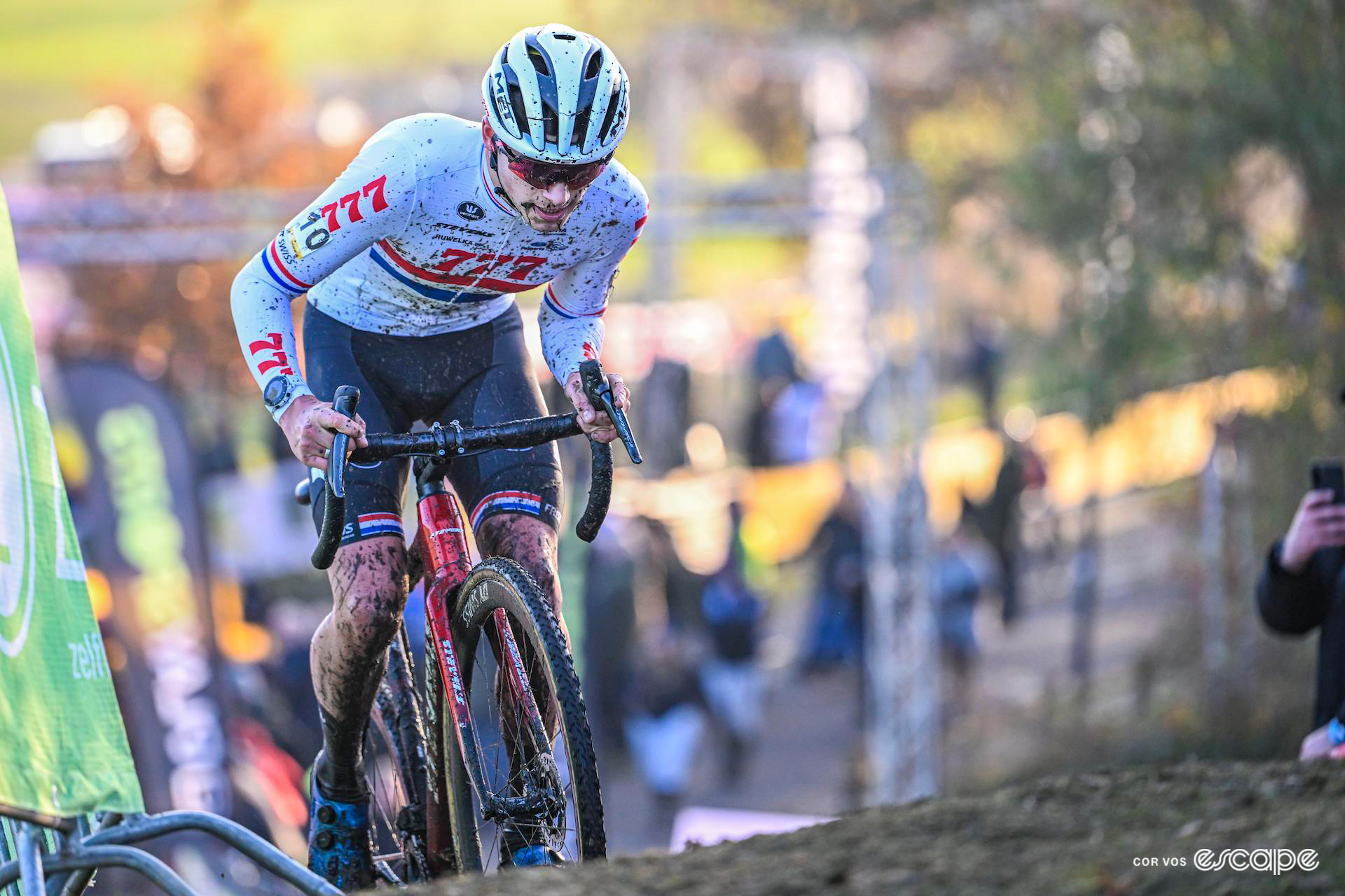Cameron Mason in the mud-spattered British national champion's jersey during Cyclocross Superprestige Boom.