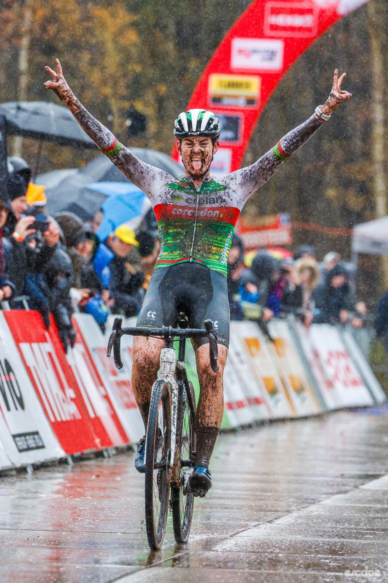 Marion Norbert Riberolle celebrates victory at a very wet and muddy Exact Cross Essen.