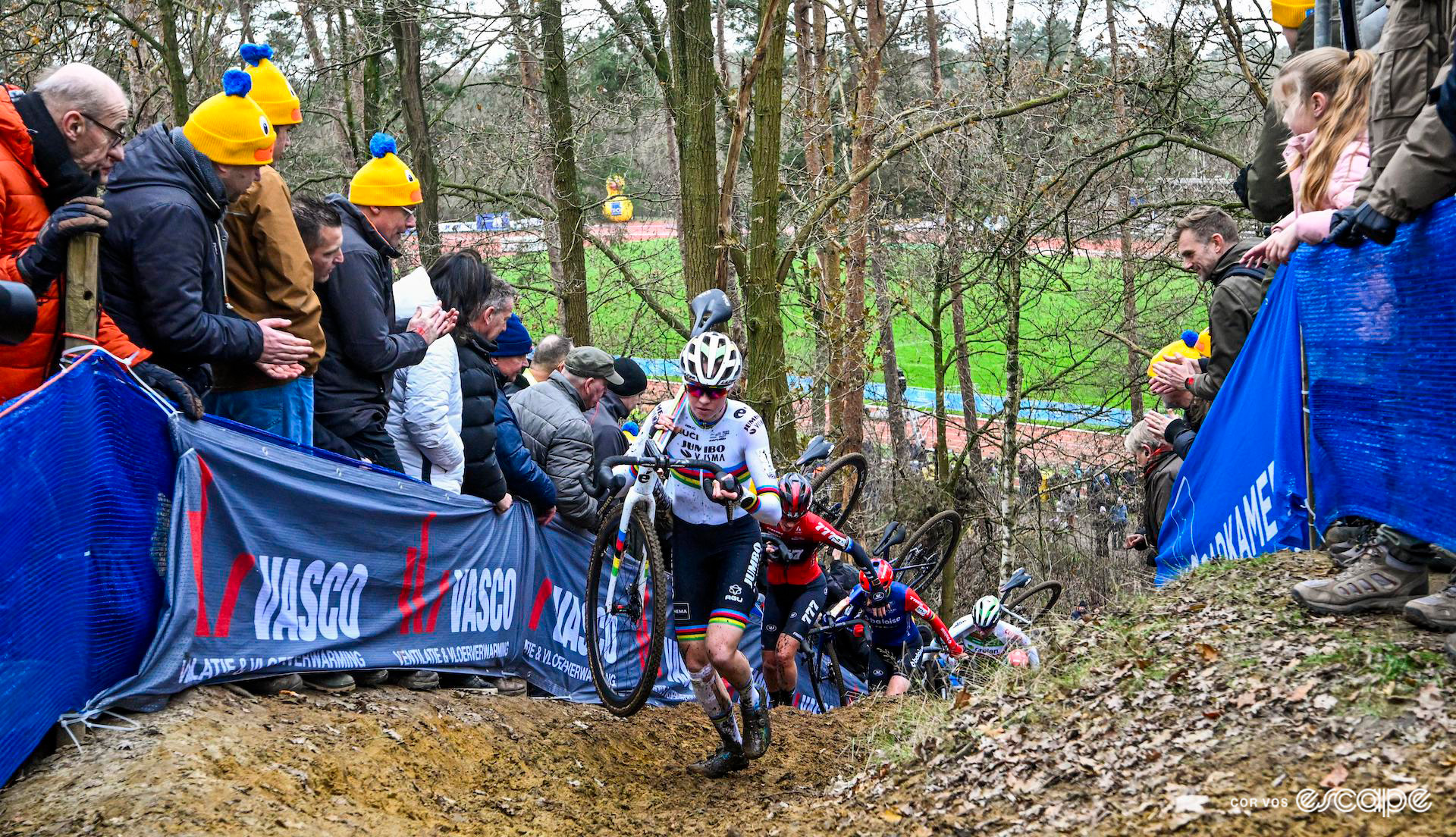 World champion Fem van Empel leads Annemarie Worst, Lucinda Brand and the rest of the elite women up a steep climb on foot during X2O Trofee Herentals.
