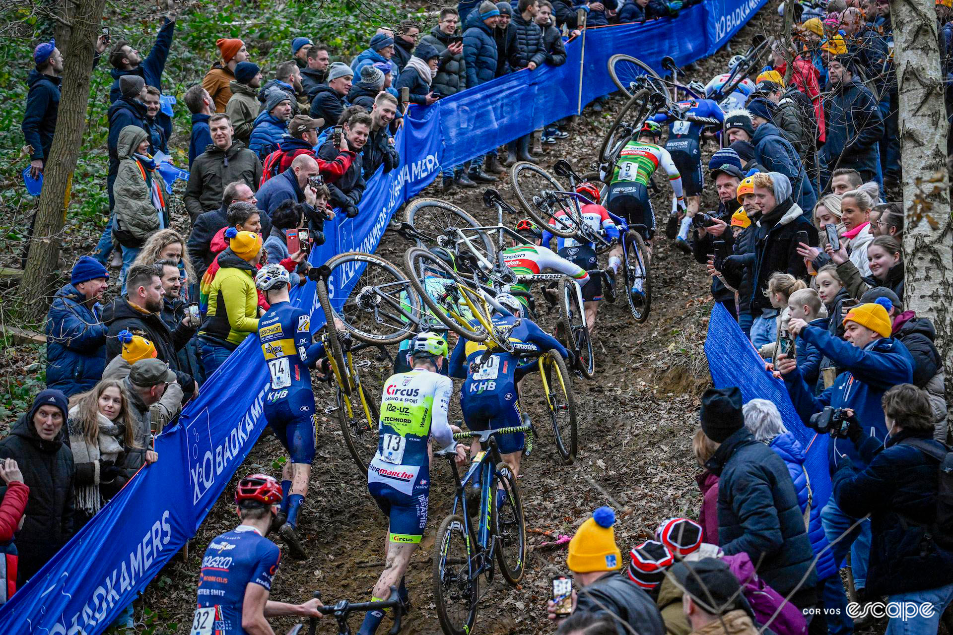 The elite men run up the steep climb through the woods during X2O Trofee Herentals.