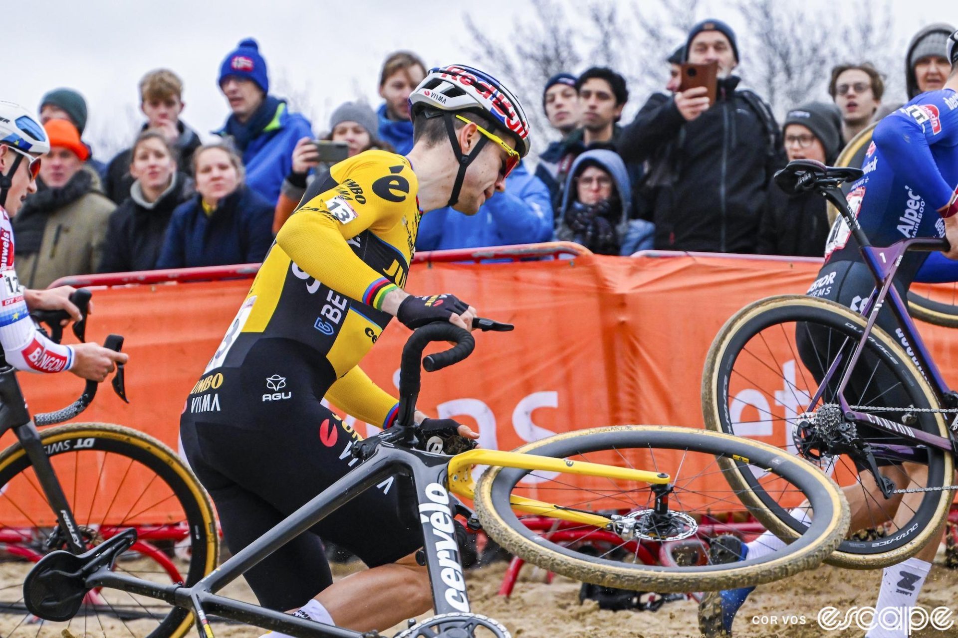 Wout van Aert fights his bike and traffic in the sand at Antwerp.