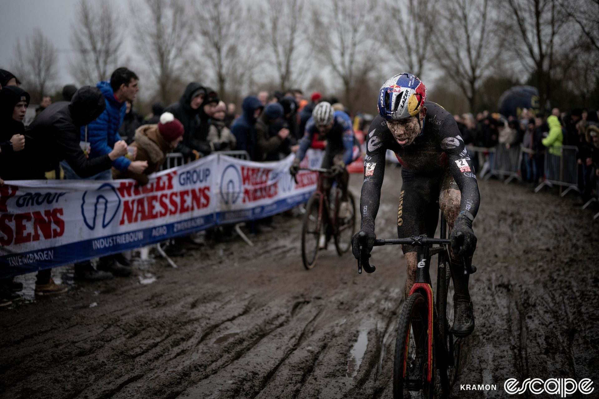 Wout van Aert leads Mathieu van der Poel in a muddy section at the Loenhout CX race in December 2022.