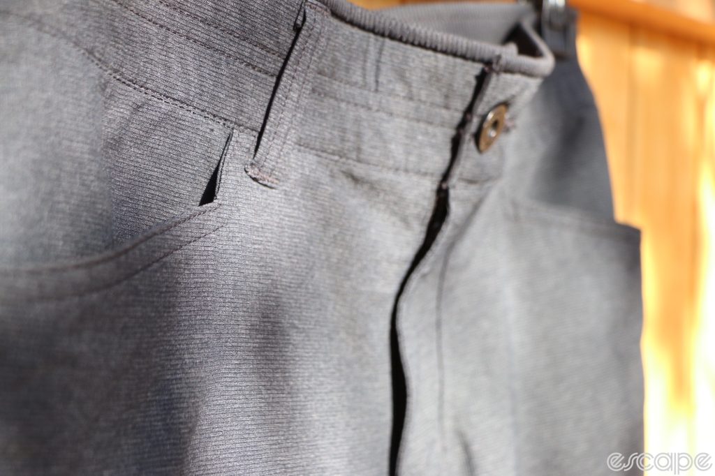 A detail shot of Kuhl's Deceptr pants, showing the basket-weave fabric around the waistband.