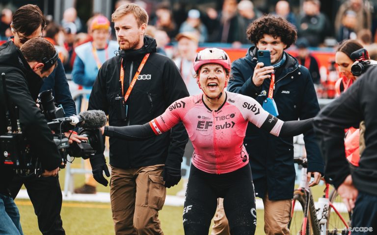 Alison Jackson greets EF Education-TIBCO-SVB staff in shock after winning Paris-Roubaix Femmes.