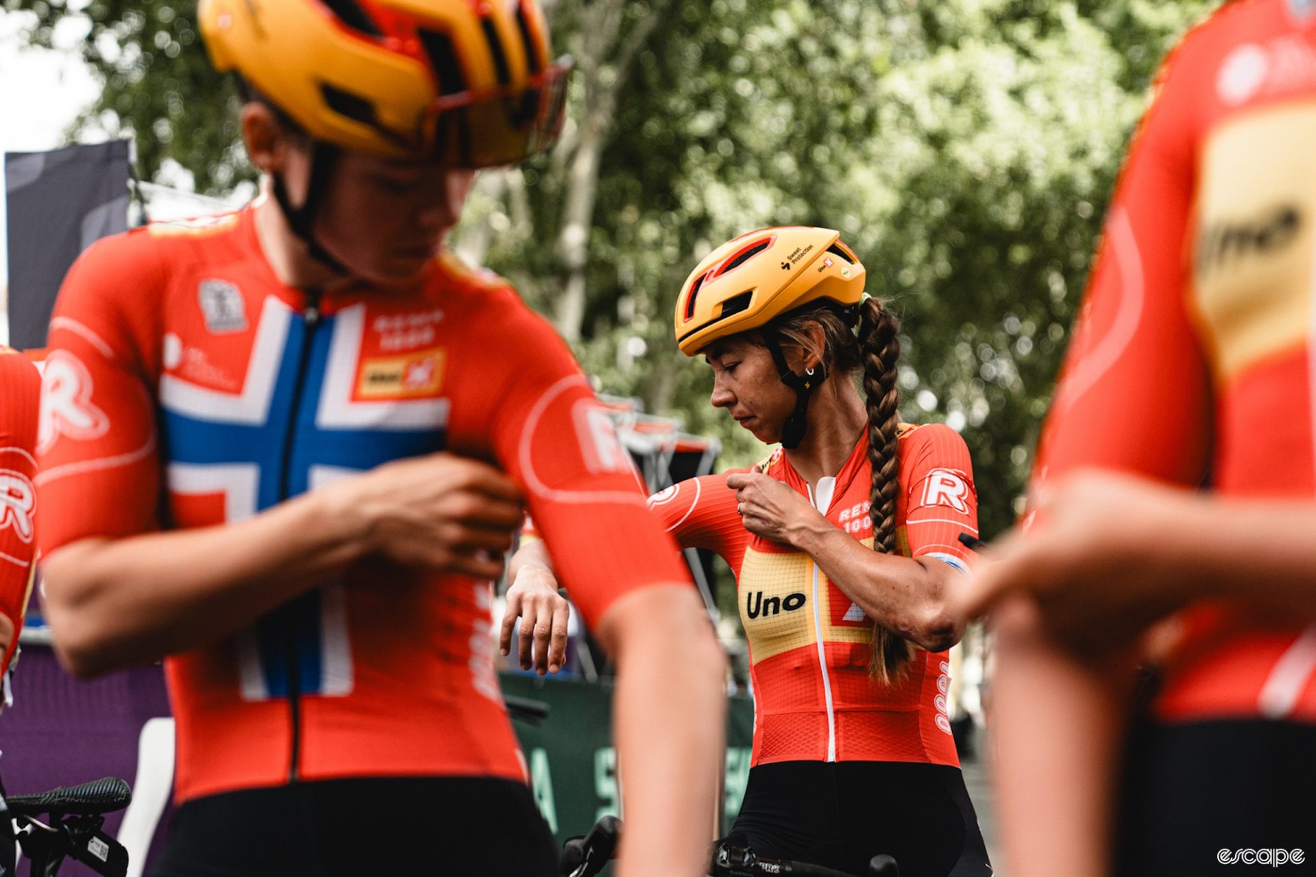 Uno-X's distinctive kits are almost all red on the jerseys with a yellow block across the chest, accented by the yellow helmets.