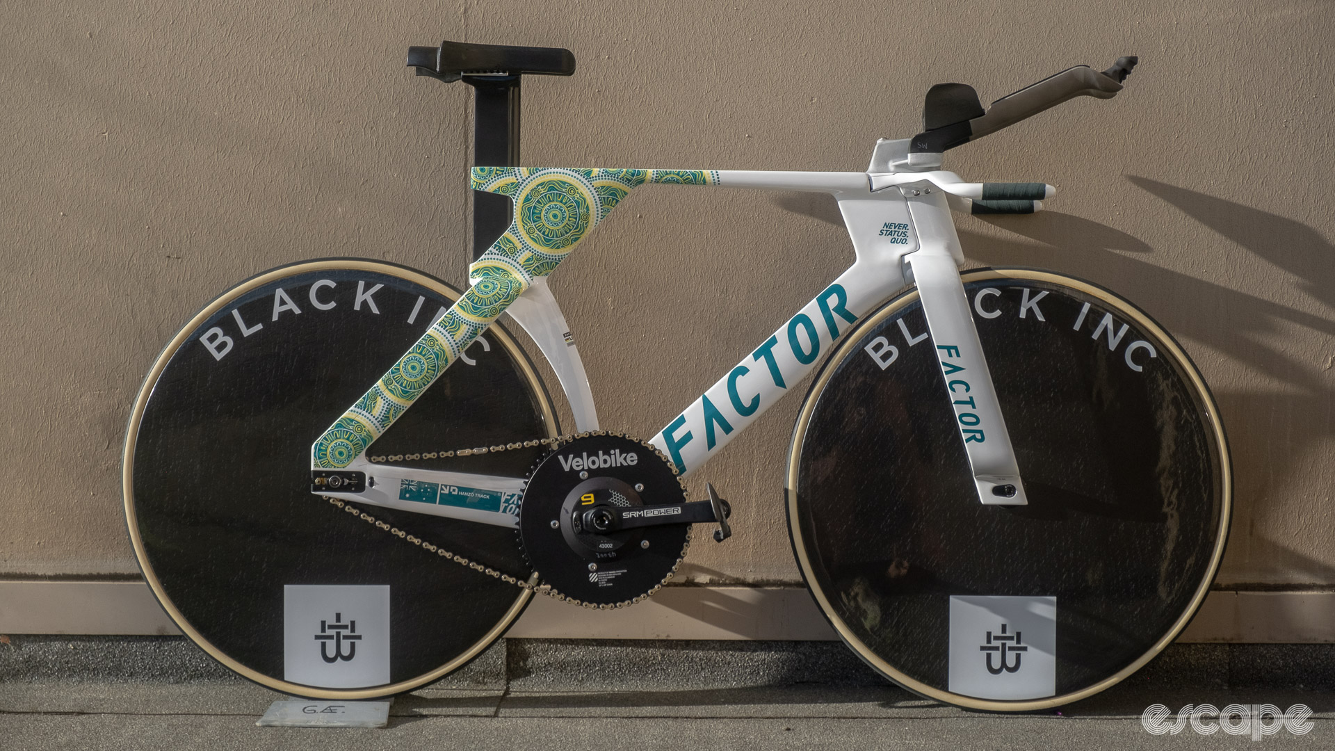 The photo shows AusCycling's Factor Hanzo Track pursuit bike against a wall.
